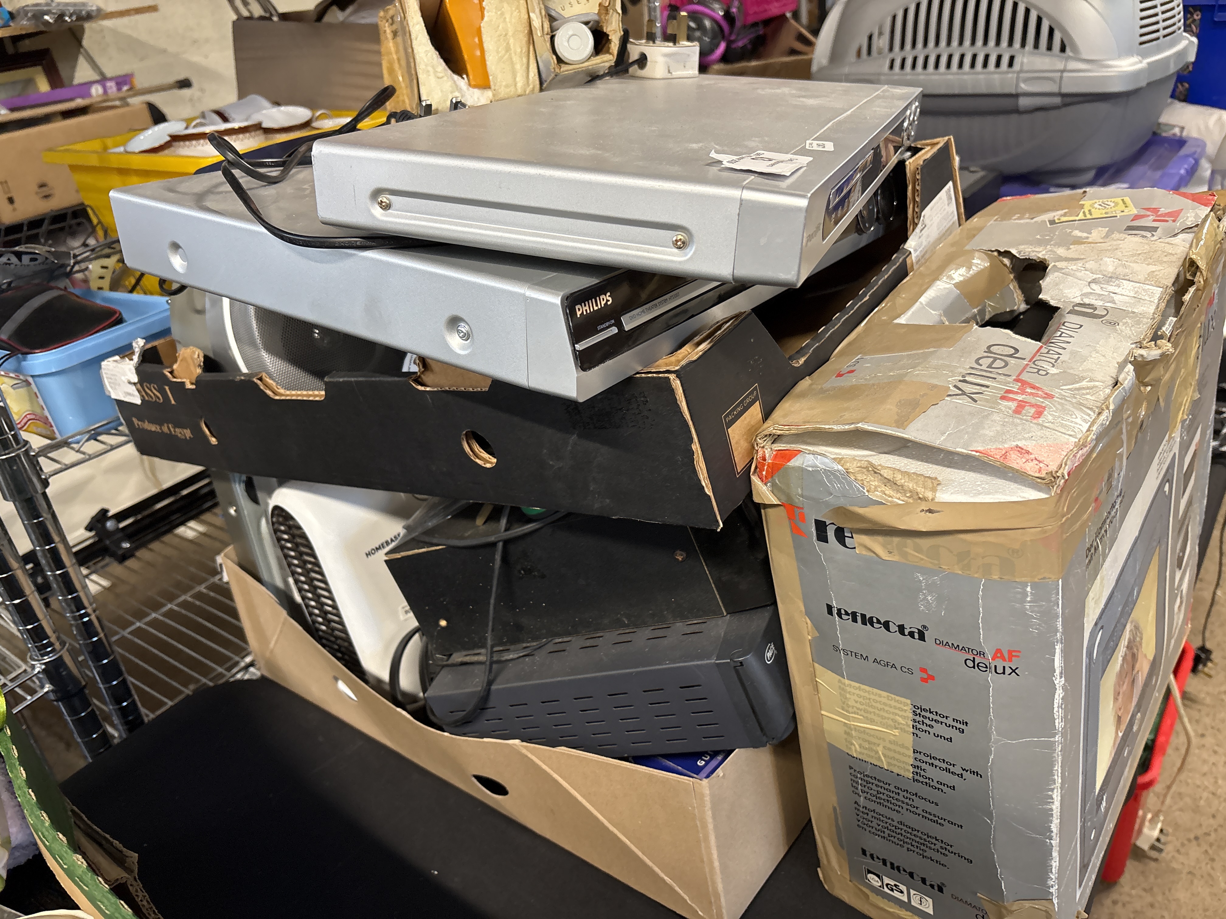 An Assortment of Vintage Consumer Electronics and Appliances Including Philips and Reflecta Units