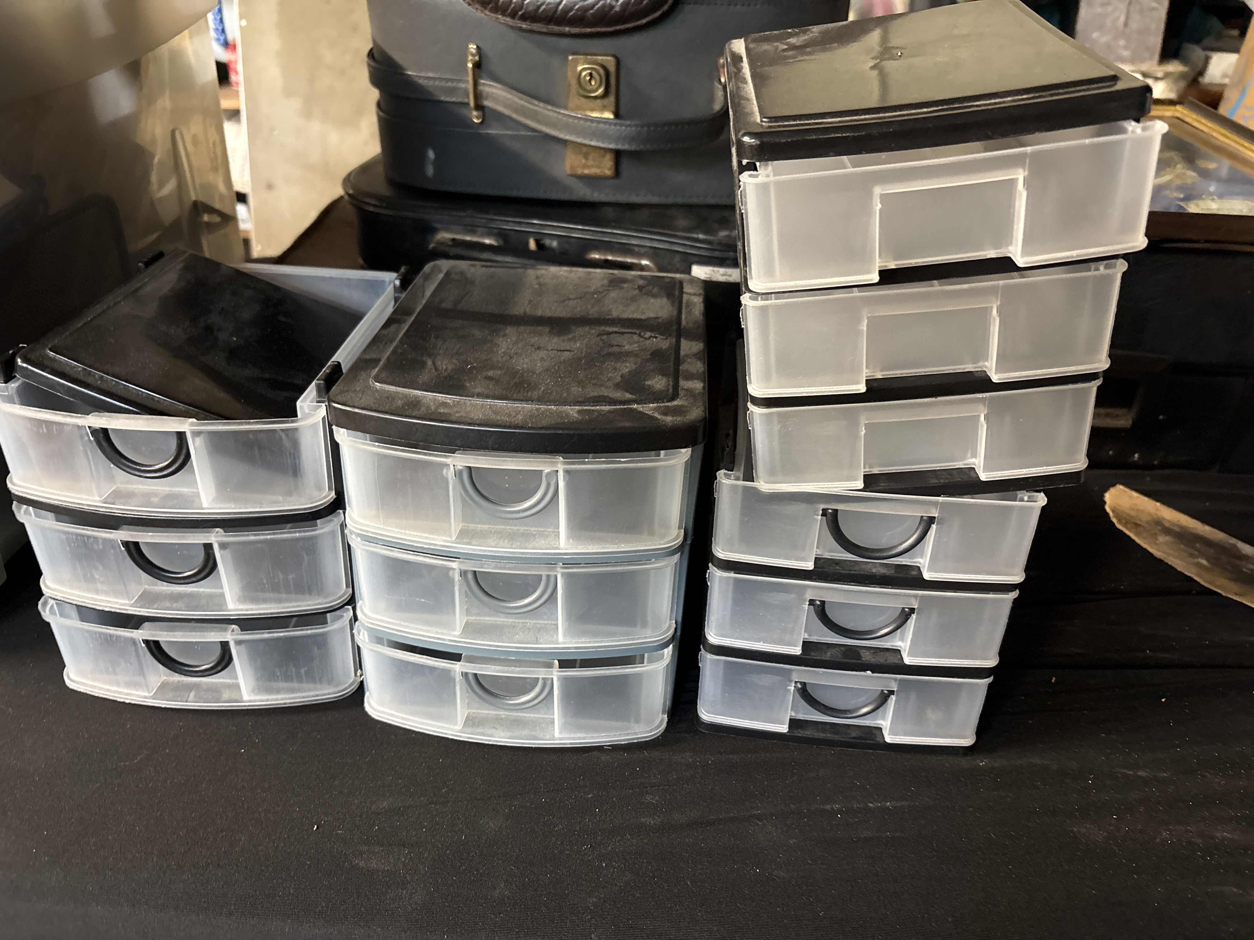 A Collection of Homz and Rubbermaid Plastic Storage Drawers with Vintage Hard-Sided Cases