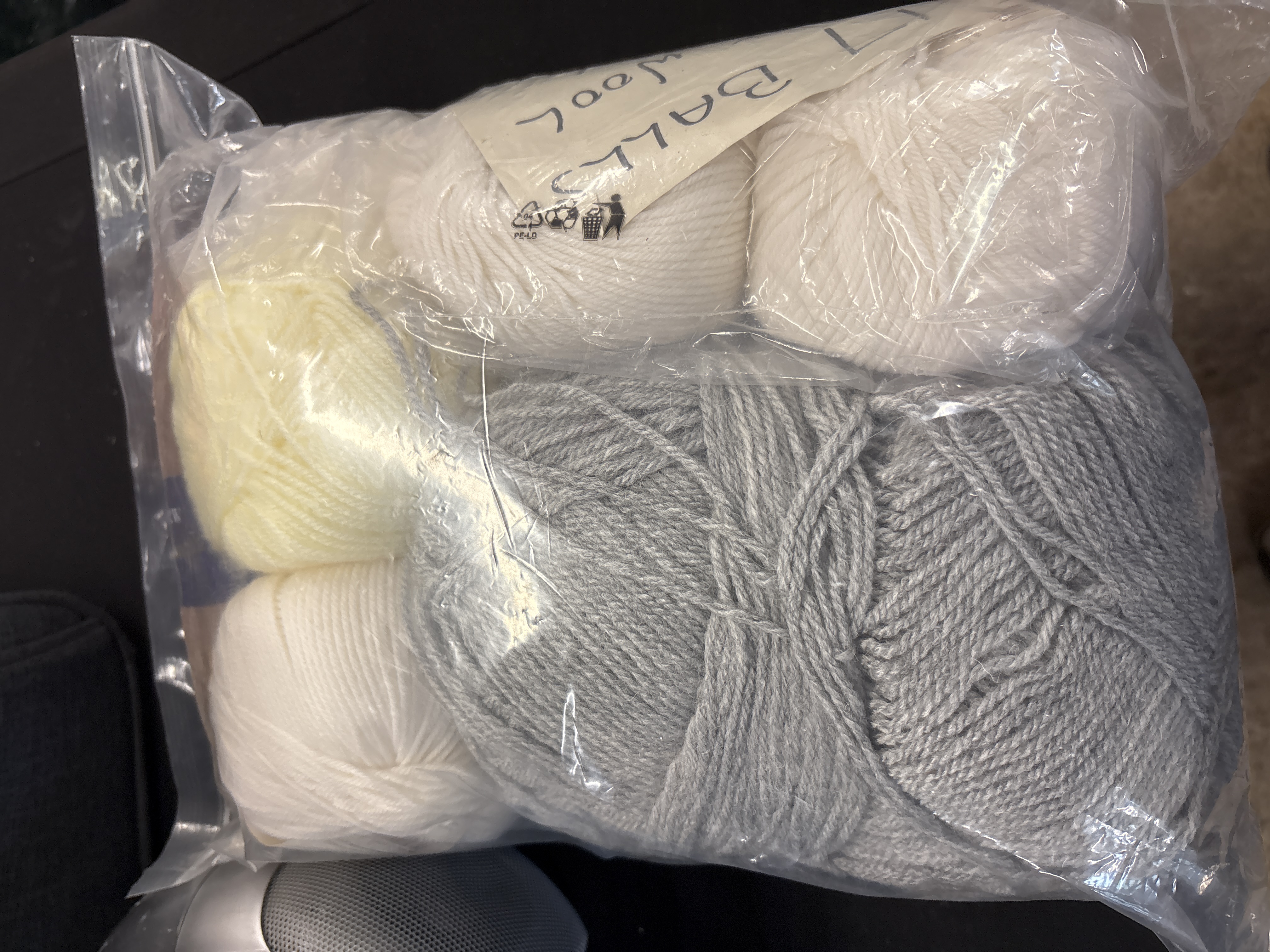 A Collection of 12 Balls of 100% Wool Yarn Including Rowan