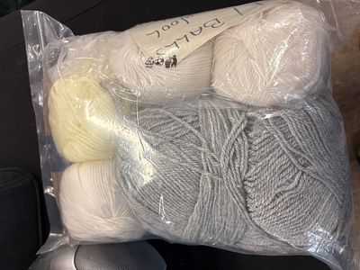 A Collection of 12 Balls of 100% Wool Yarn Including Rowan