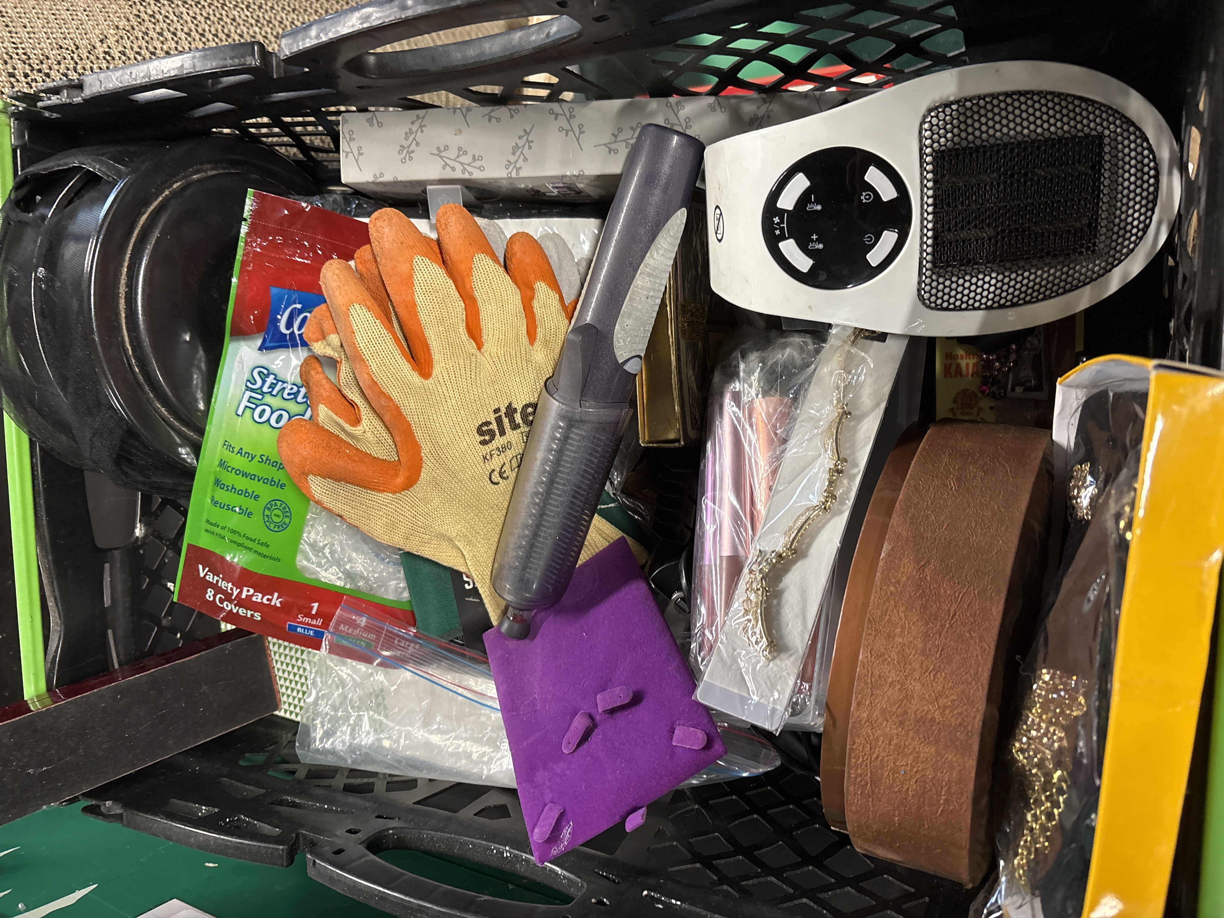 An Assortment of Household Goods, Beauty Accessories, and Utility Tools