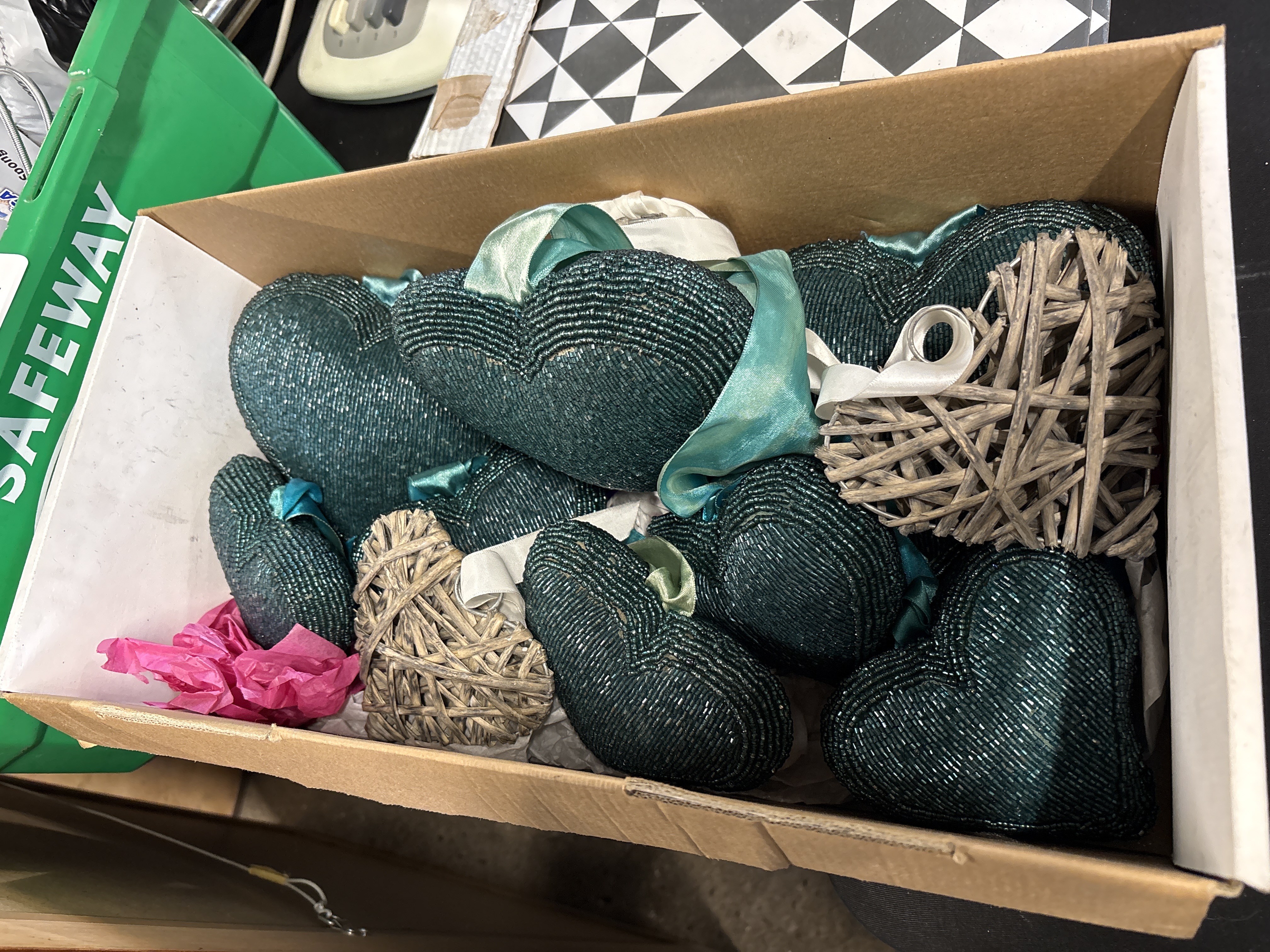 An Assortment of Nine Beaded and Woven Heart-Shaped Hanging Ornaments