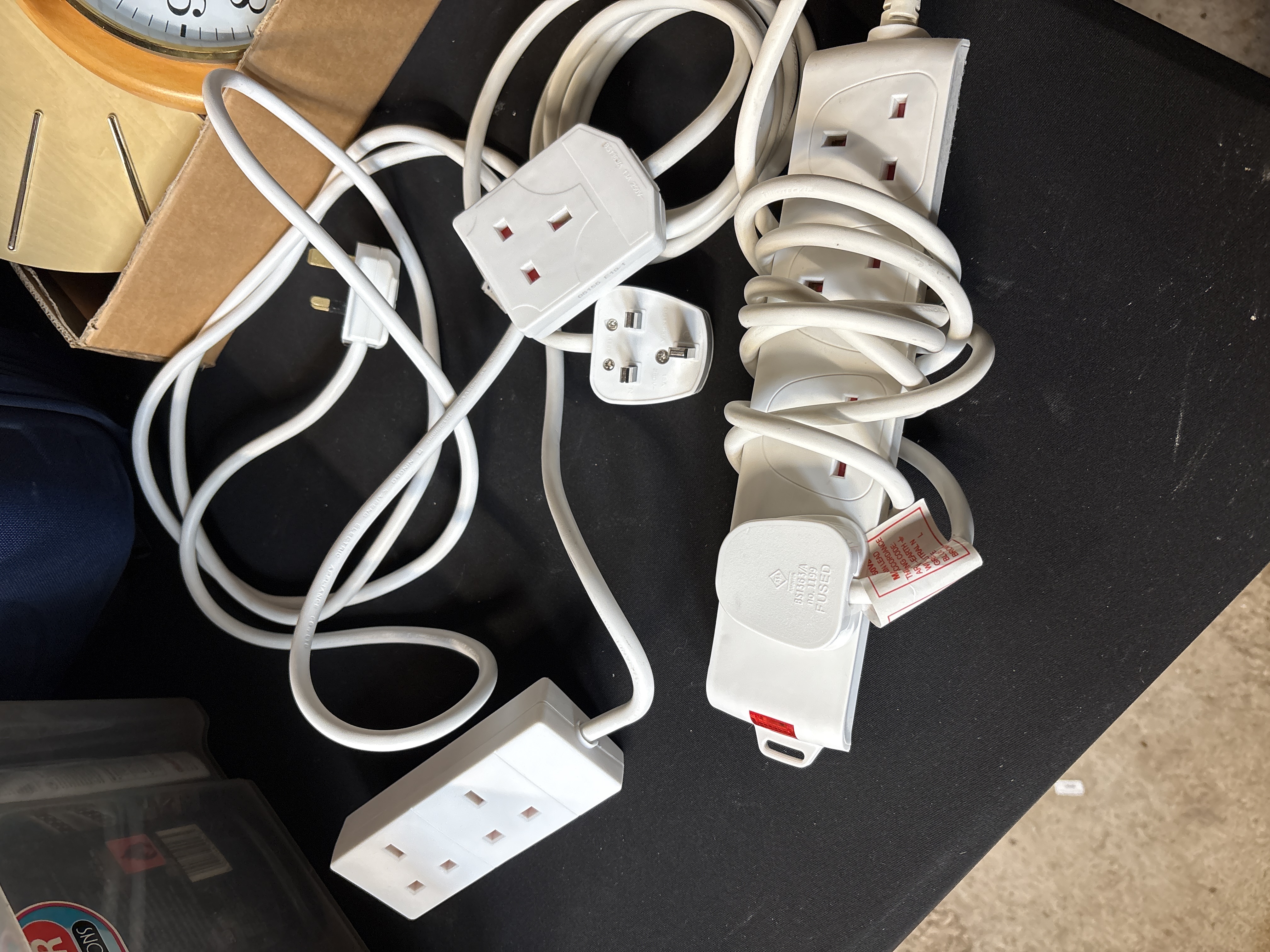 An Assortment of UK Mains Power Extension Leads and Adapters