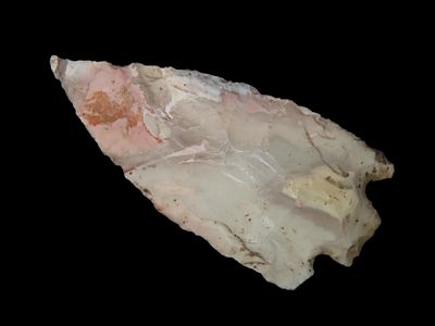 Colorful 3 7/16" Smith, Cooper Co. Missouri. Made from a heavily patinated piece of Mozarkite 