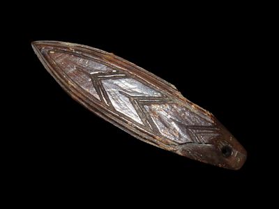 3 1/16" Heavily Engraved Alaskan Eskimo Pendant, Fossilized Bone. Highly Polished and heavily 