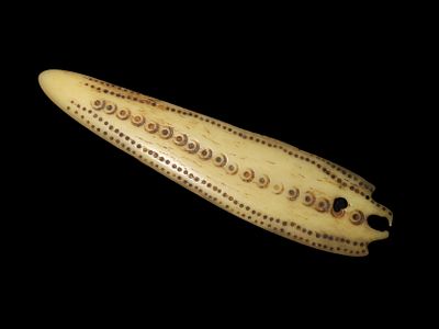 4 1/4" Engraved Northwest Coast Pendant. Motley COA. Intricately engraved and designed bone 