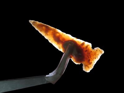 Translucent Knife River Sidenotch, Montana. Nice long Slender example, thin and well flaked 