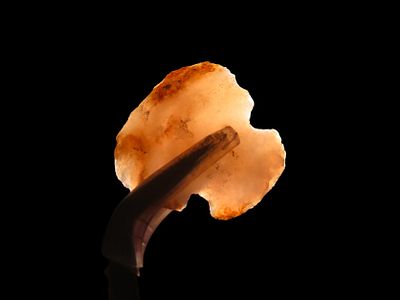 Highly Translucent Agate Notched Scraper found in New Mexico. Great Example! Nice Color!