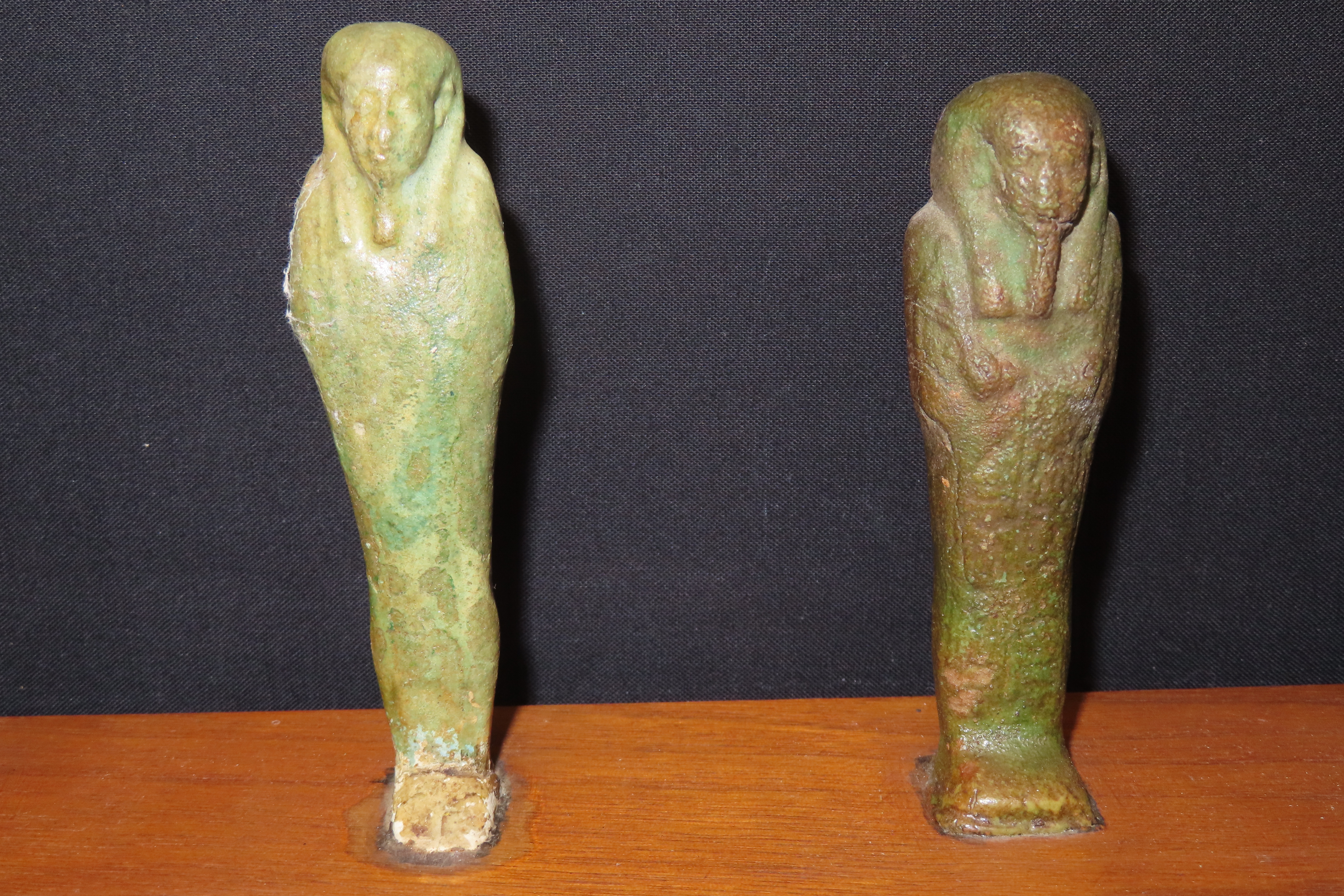 33" x 3" Wooden Display Containing 11 Egyptian Ushabtis, All Different Examples