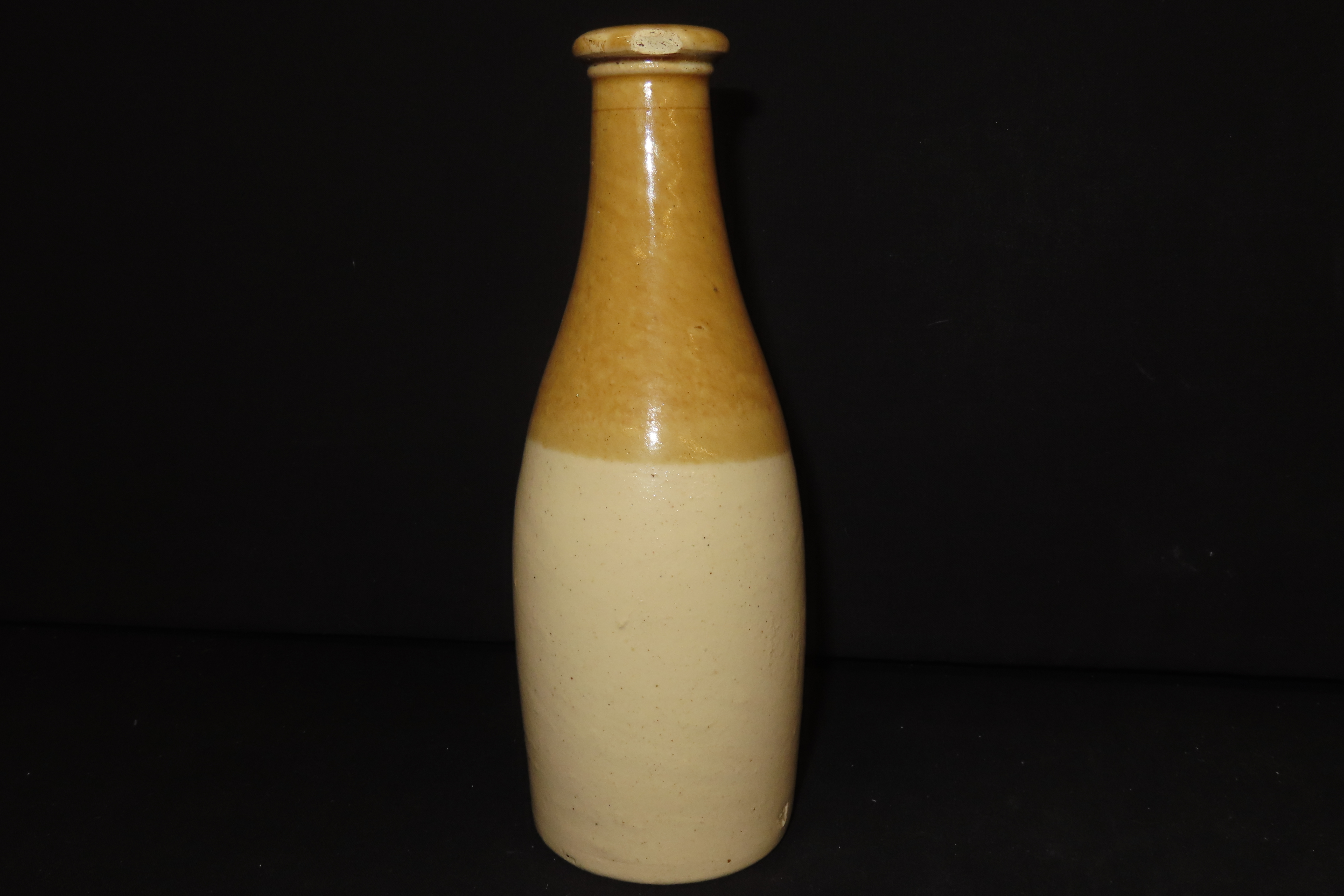 Lot of 2 Brown-in-White Ginger Bottles and 1 Advertised Rye Bottle