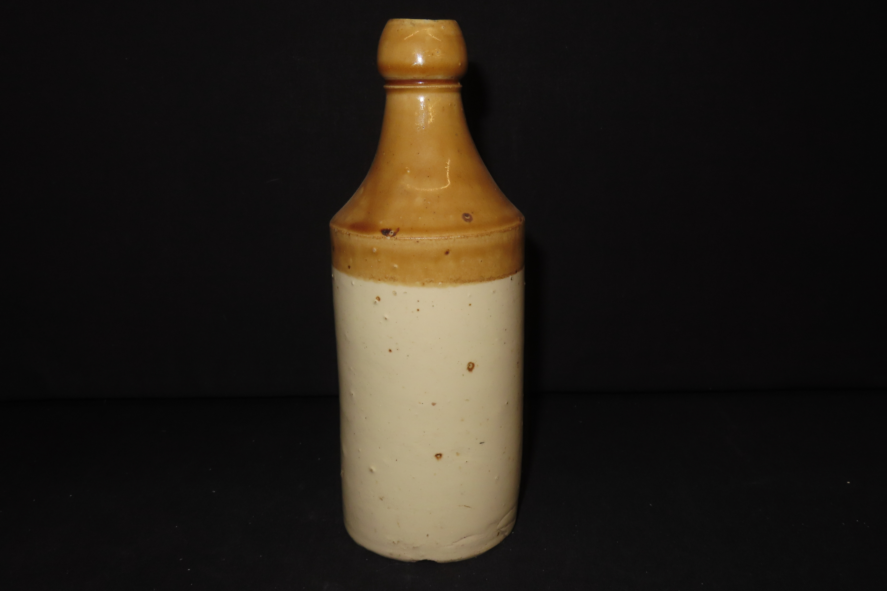 Lot of 2 Brown-in-White Ginger Bottles and 1 Advertised Rye Bottle