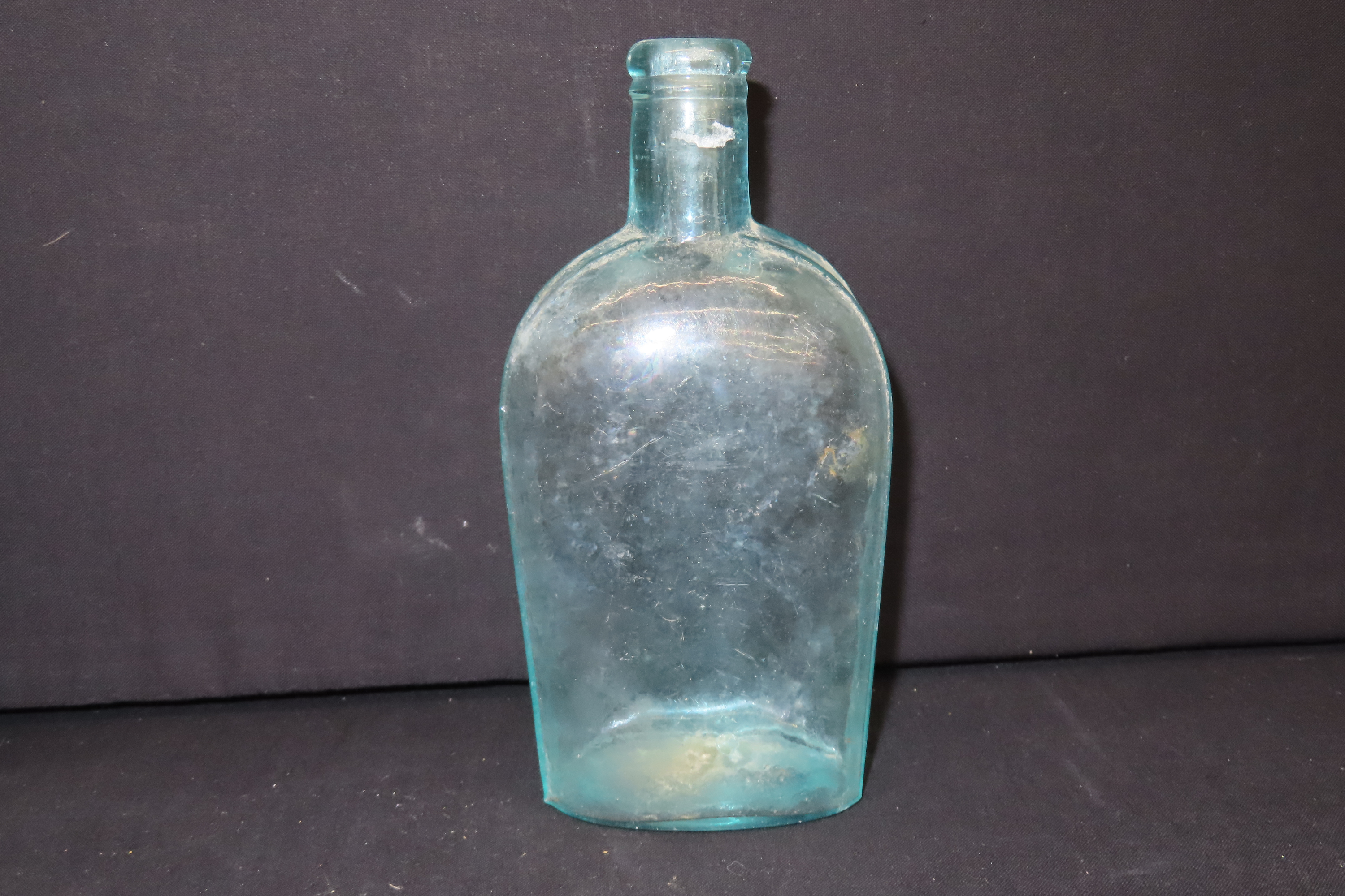 Lot of 2 Antique Molded Bottles, Including 1 Embossed “Warranted" Flask