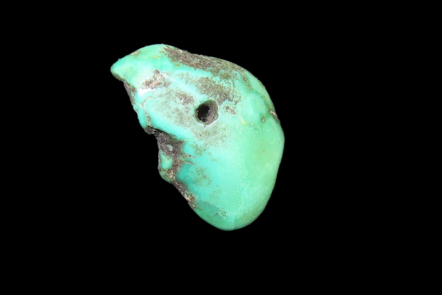 Colorful Mimbres / Hohokam Turquoise Pendant found in Arizona. Nicely shaped and polished example, drilled for suspension.