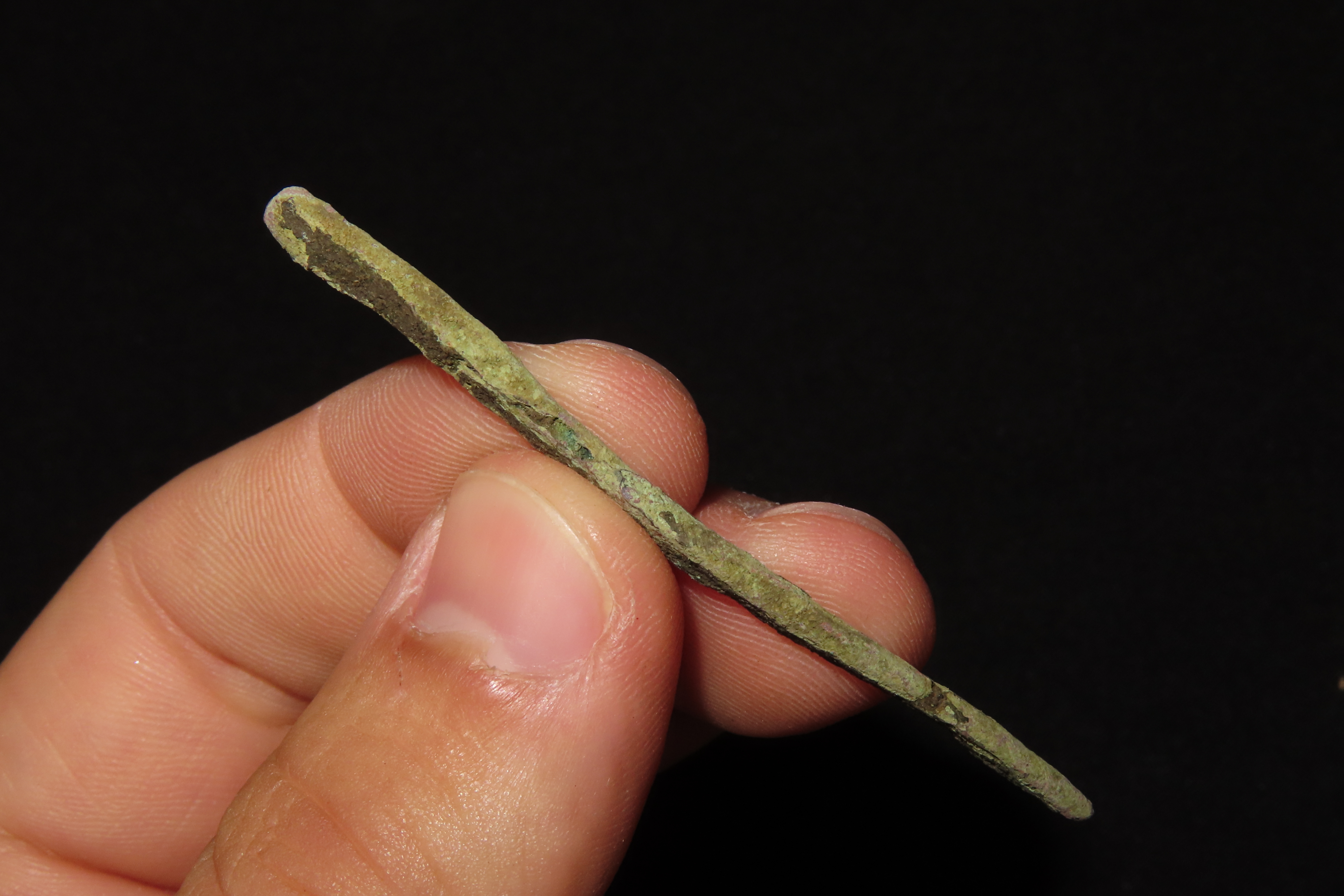2 7/16" OCC Copper Awl / Pin found in Michigan. Squared sides and heavy patination.
