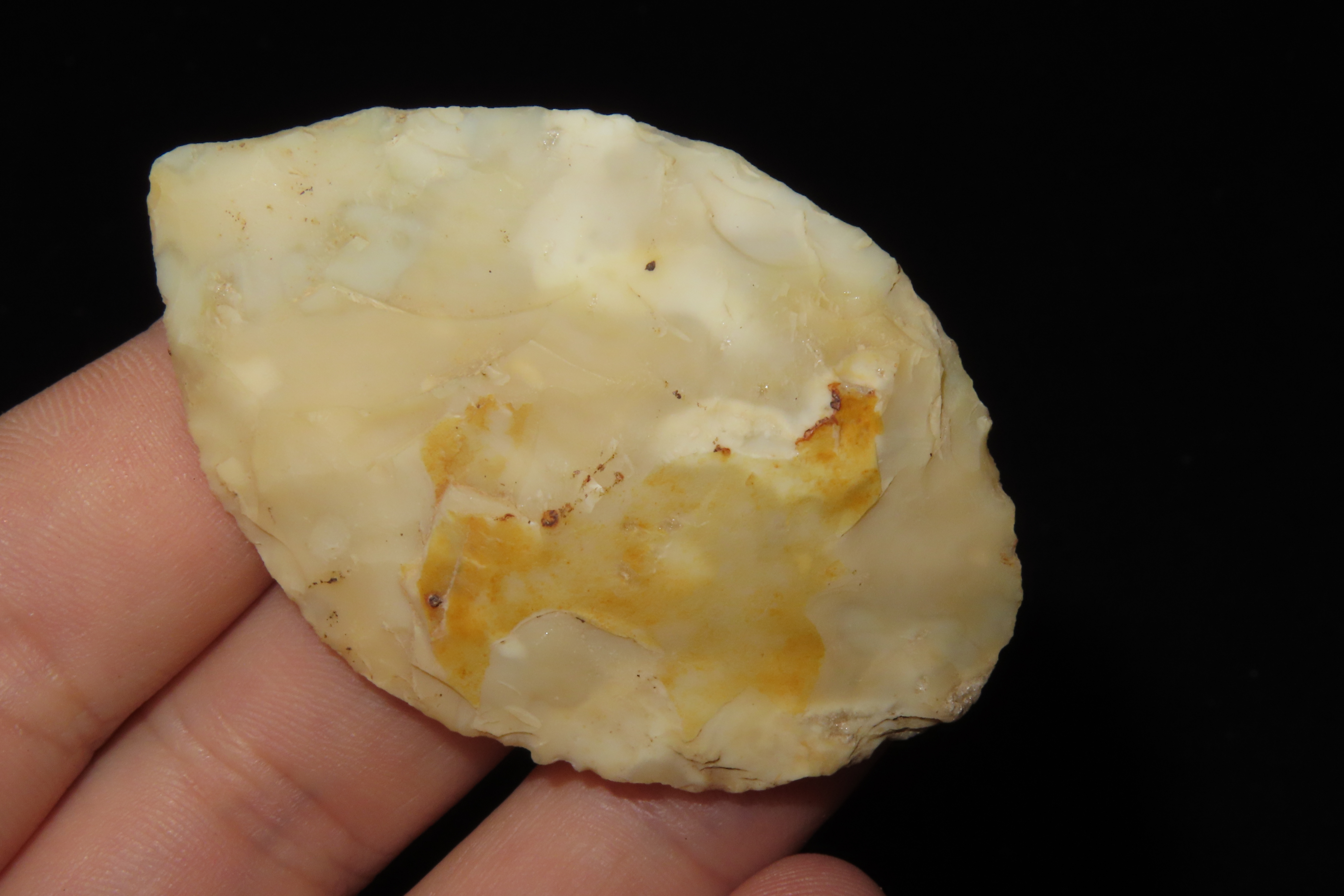 Colorful Translucent 2 7/16" Flint Ridge Ovoid Knife Blade found in Scioto County Ohio.
