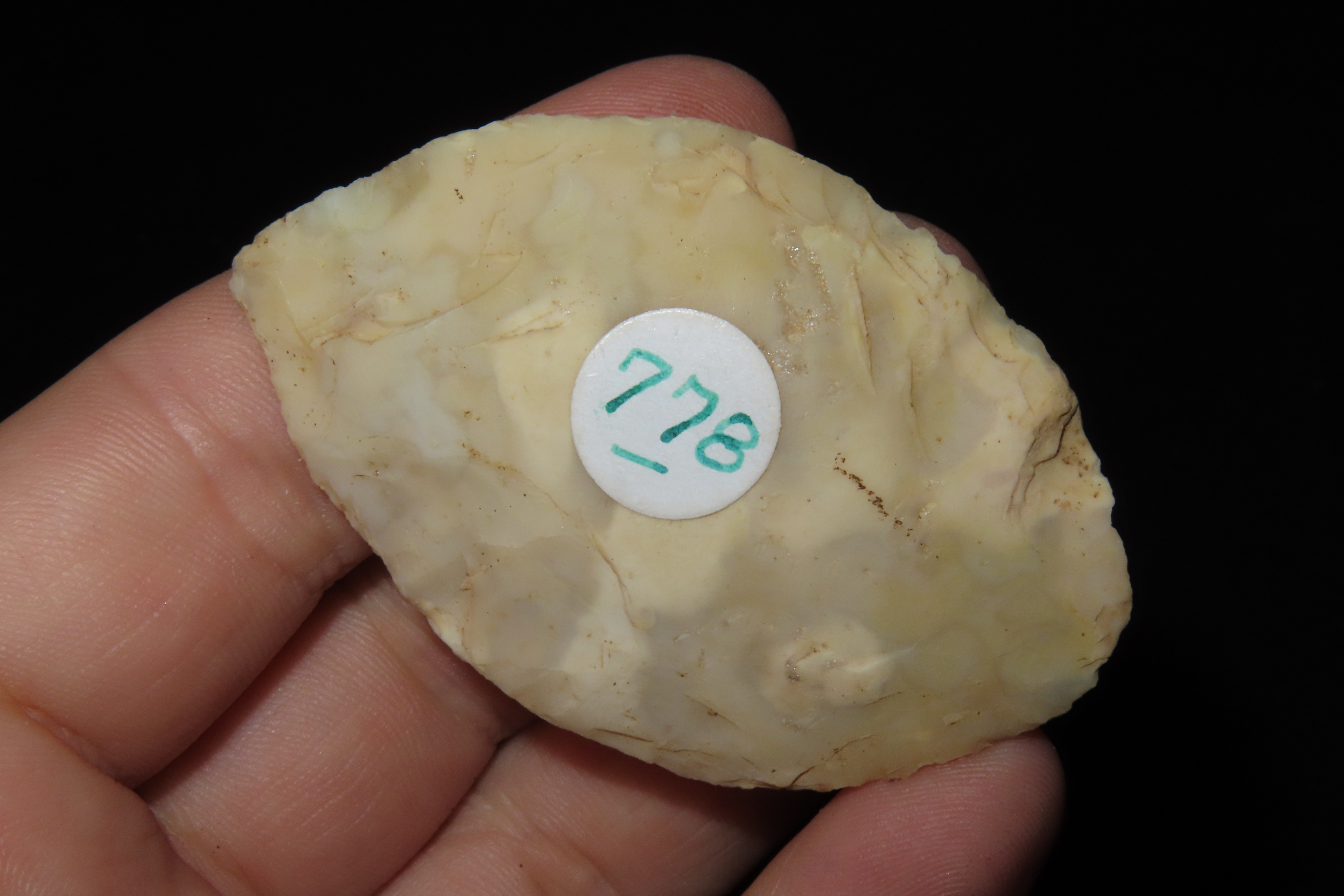 Colorful Translucent 2 7/16" Flint Ridge Ovoid Knife Blade found in Scioto County Ohio.