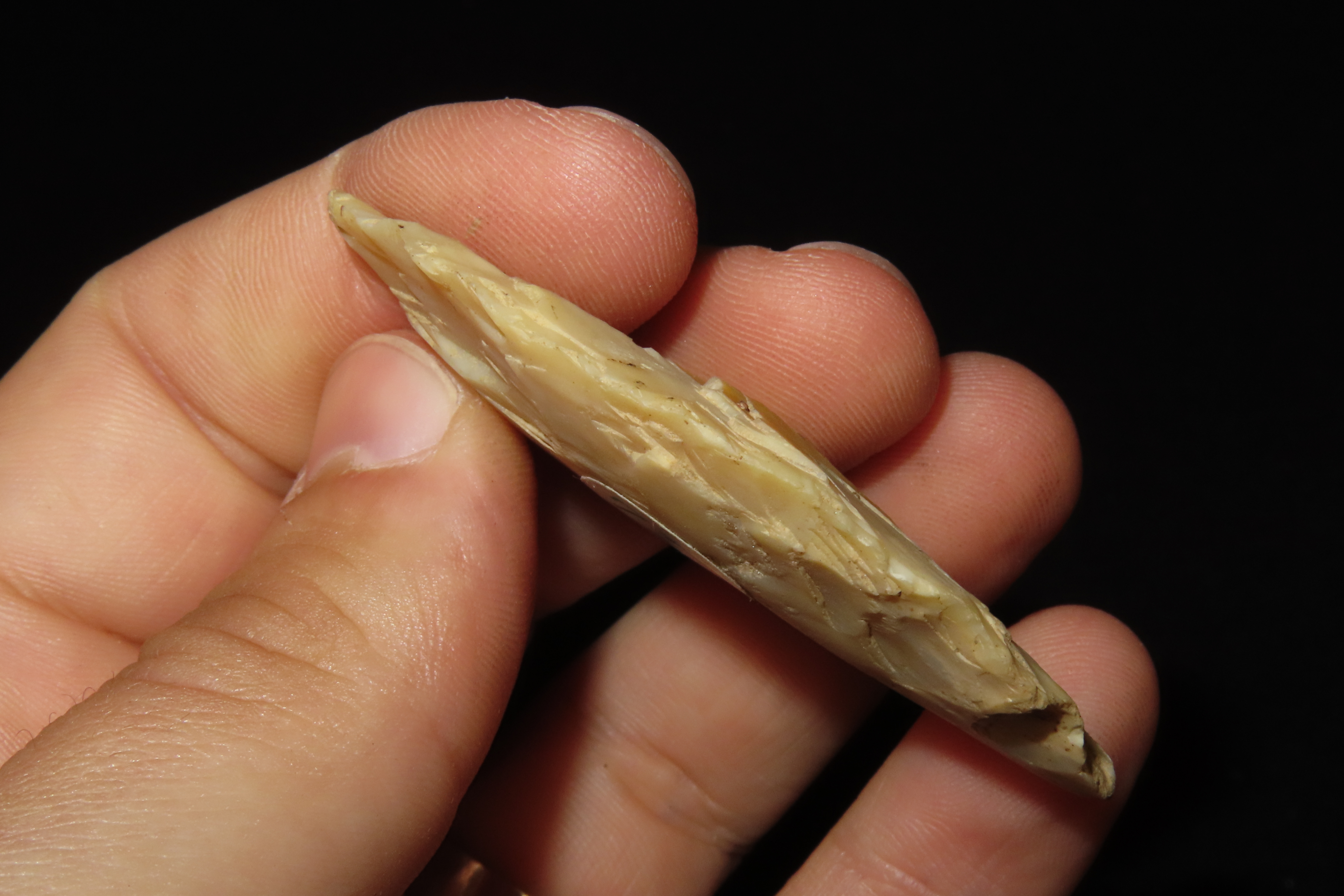 Colorful Translucent 2 7/16" Flint Ridge Ovoid Knife Blade found in Scioto County Ohio.