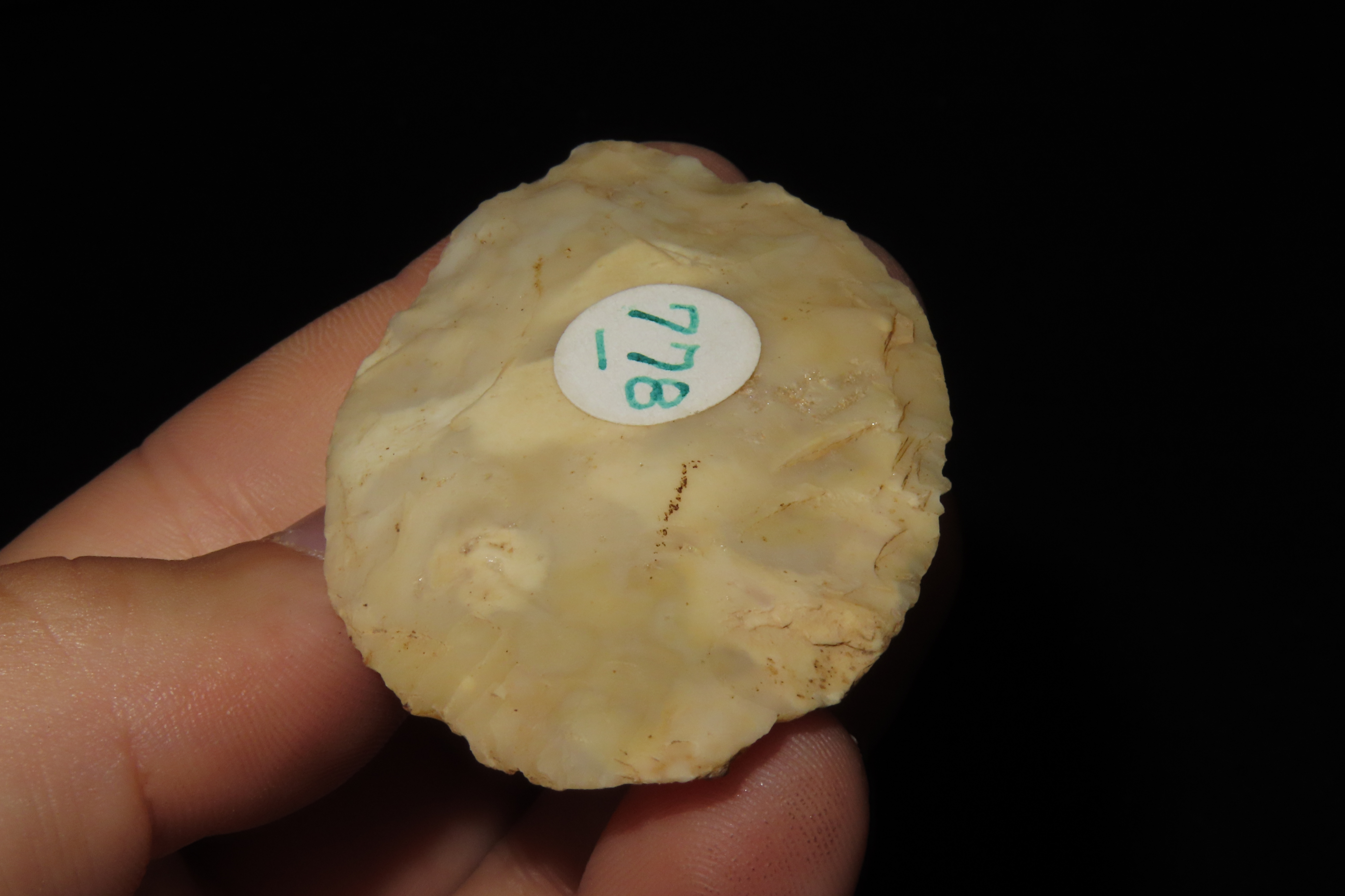 Colorful Translucent 2 7/16" Flint Ridge Ovoid Knife Blade found in Scioto County Ohio.