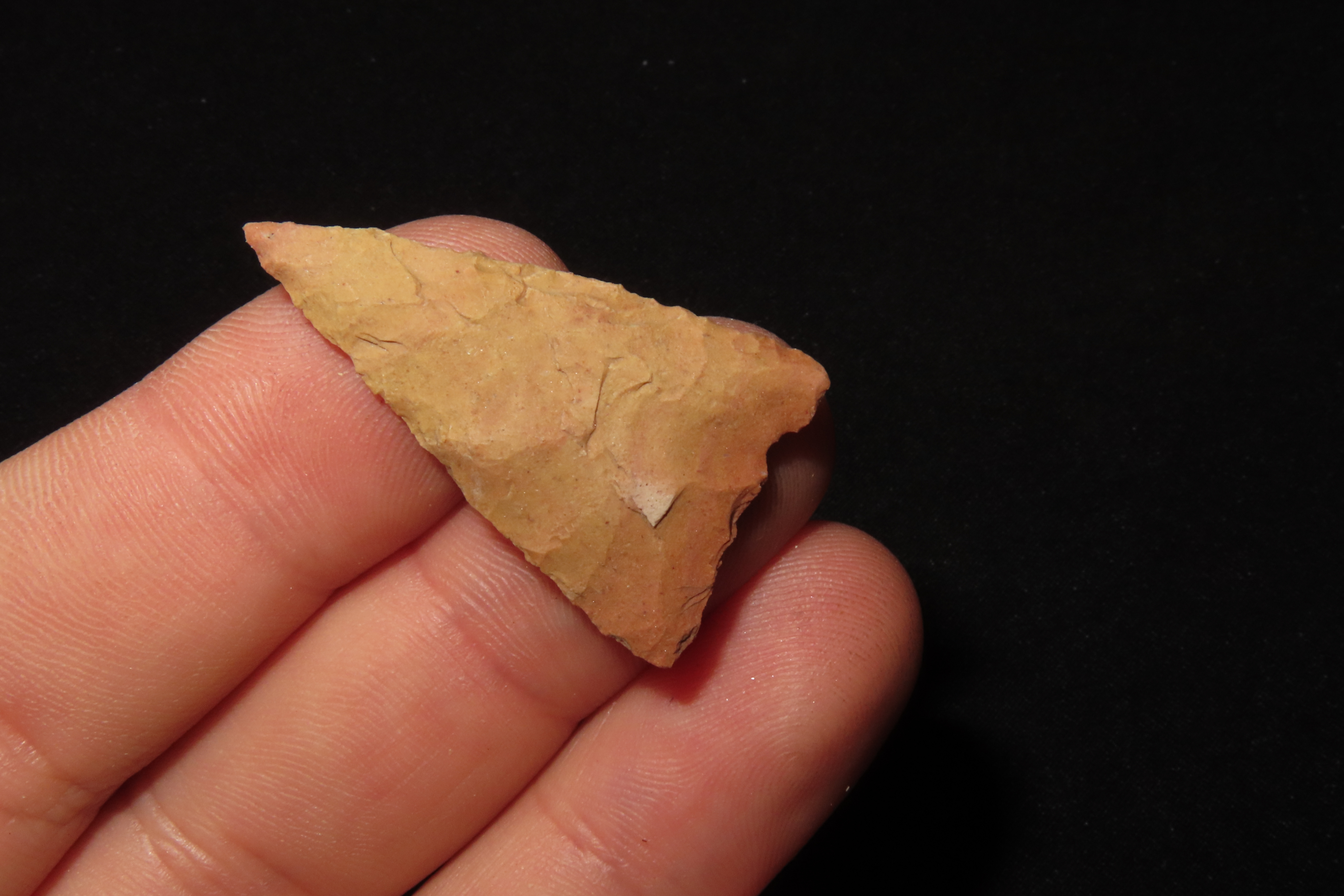 Nice Cahokia Triangle found in Madison County Illinois. Colorful, thin, and well flaked example.