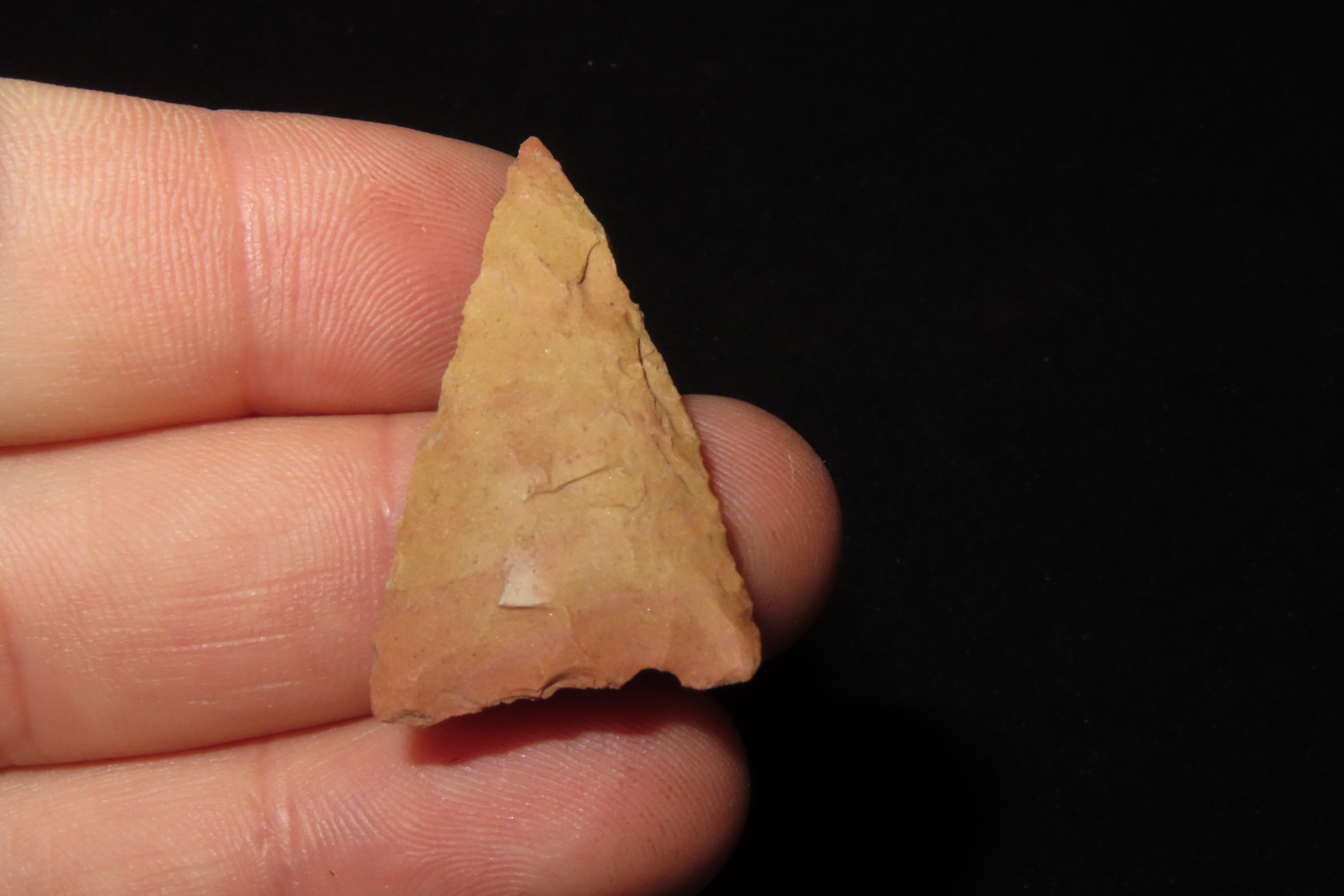 Nice Cahokia Triangle found in Madison County Illinois. Colorful, thin, and well flaked example.