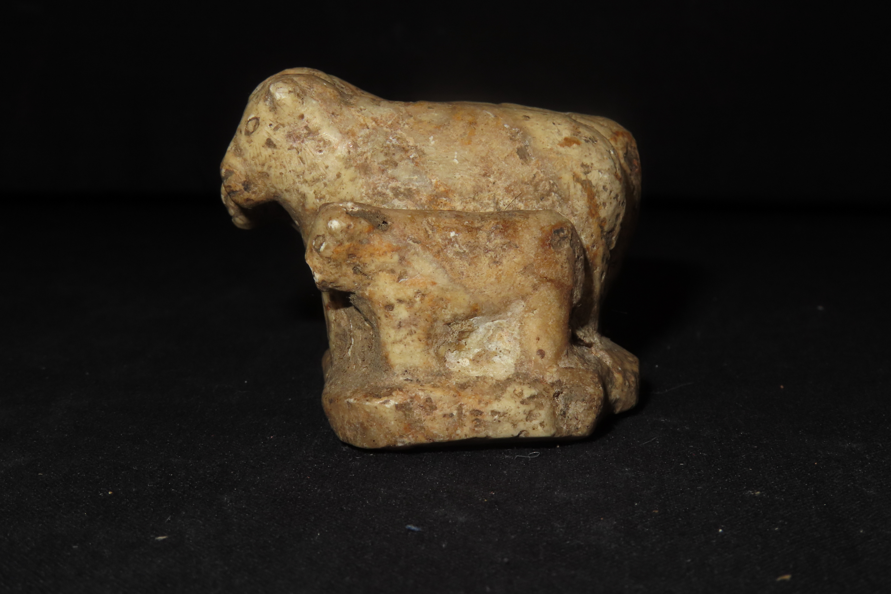 Pre-Columbian Stone Canopa Ram Family effigy from Peru, Colonial era, Nicely carved details and well patianted example.