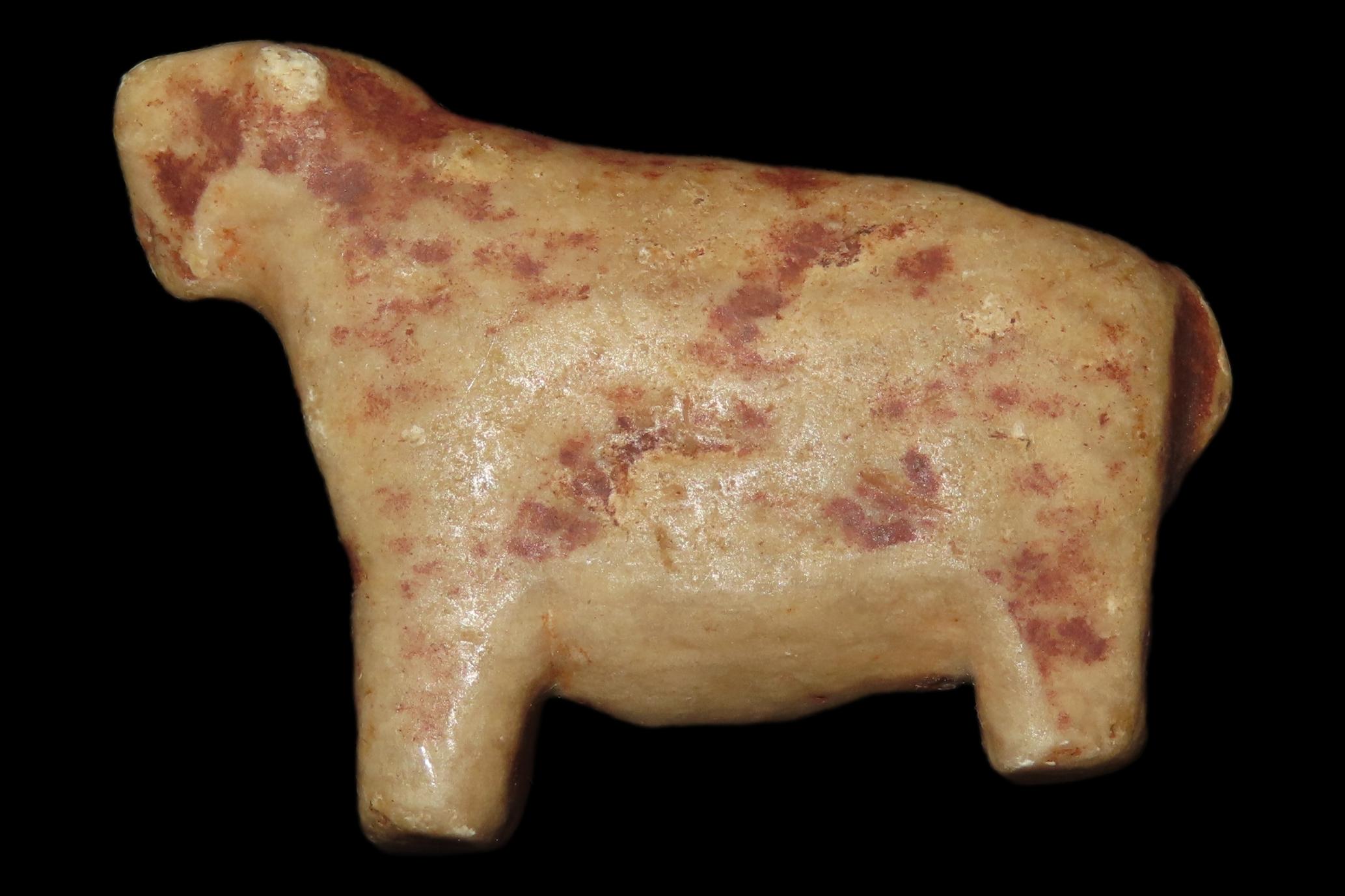 Pre-Columbian Stone Canopa Llama effigy from Peru, Colonial era, Nicely carved details and well patianted example.