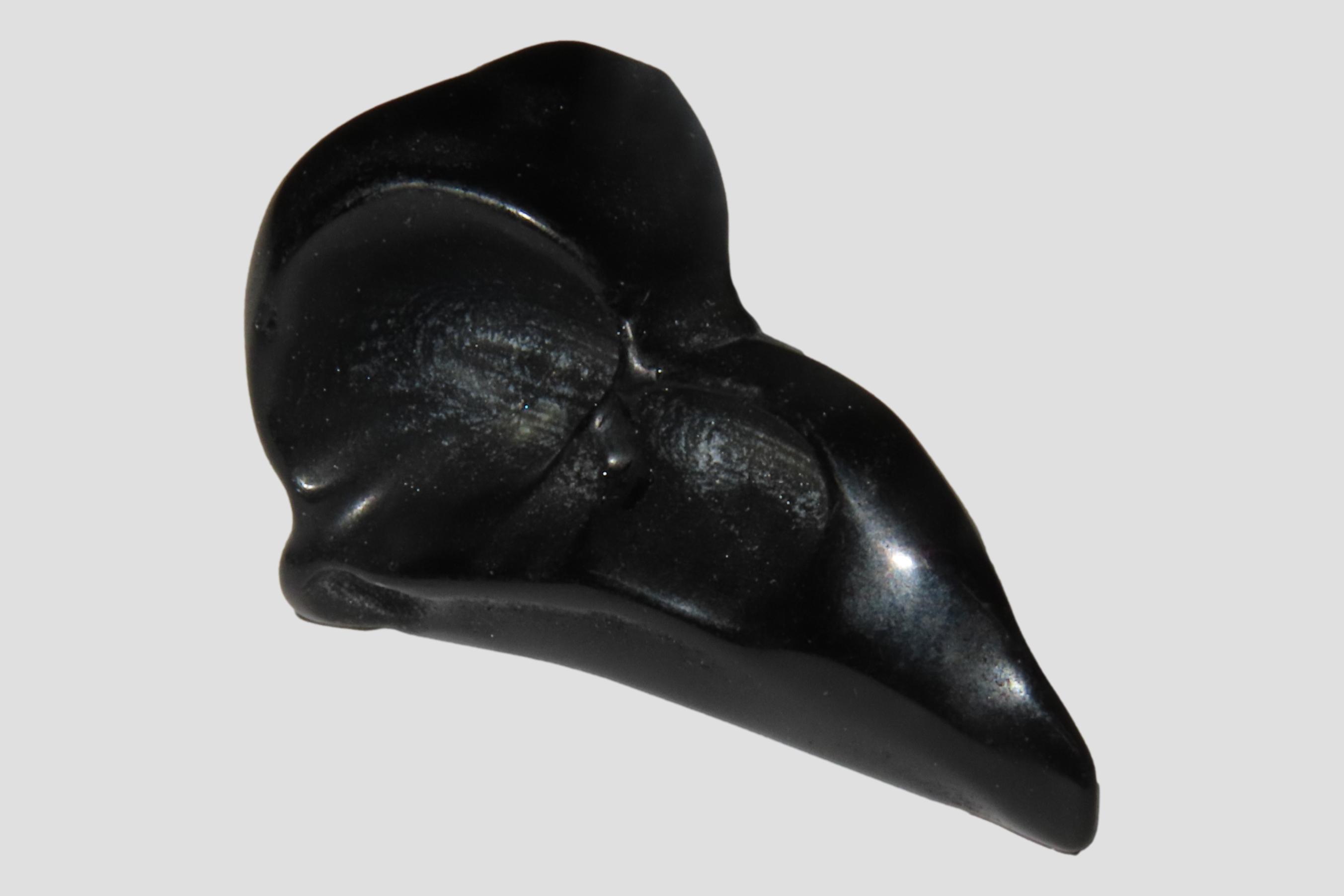 Incredible Pre-Columbian Obsidian Bird Head / Skull Effigy. Intricatly carved and polished with attention to detail. Translucent in some spo