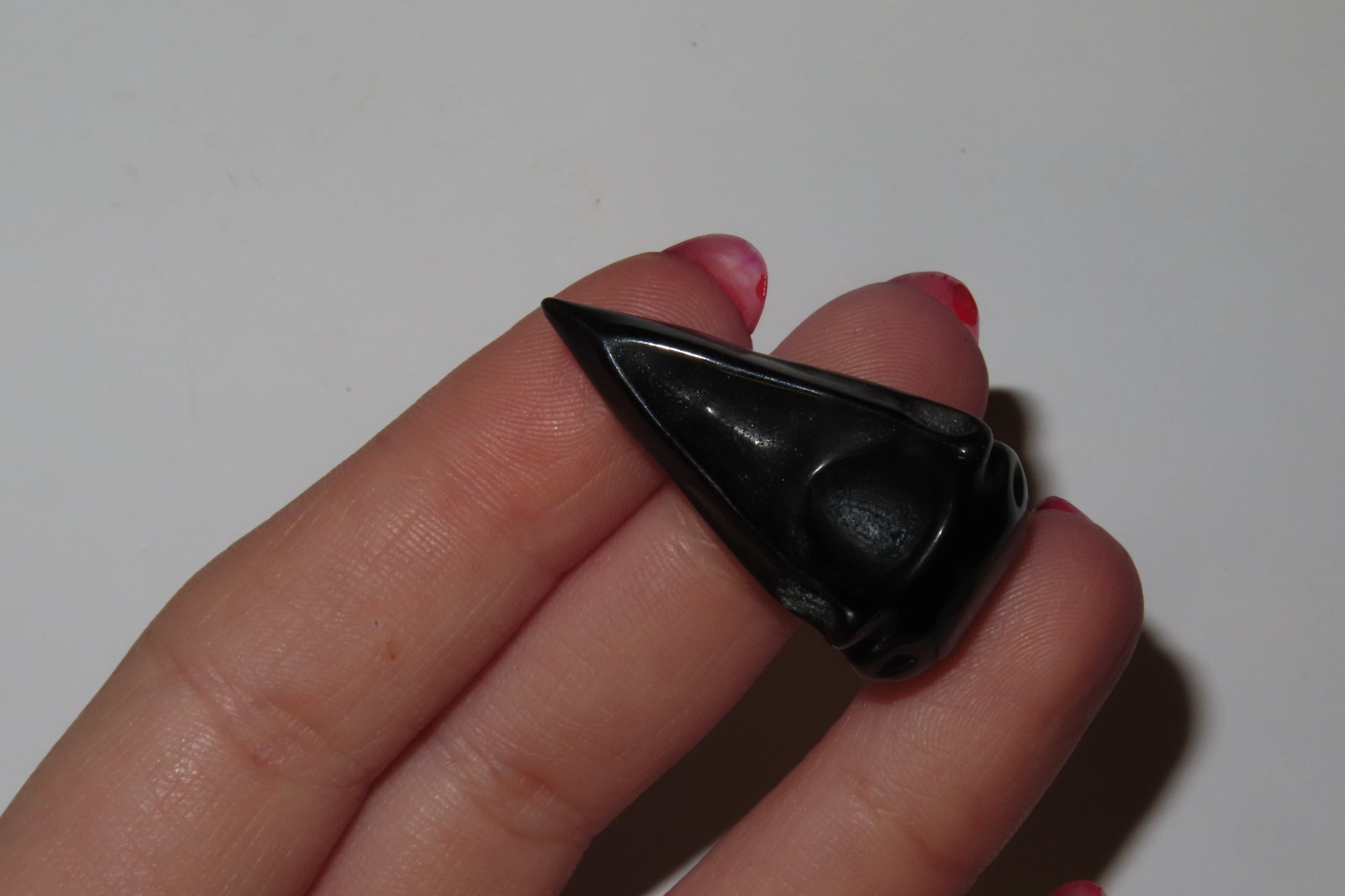Incredible Pre-Columbian Obsidian Bird Head / Skull Effigy. Intricatly carved and polished with attention to detail. Translucent in some spo