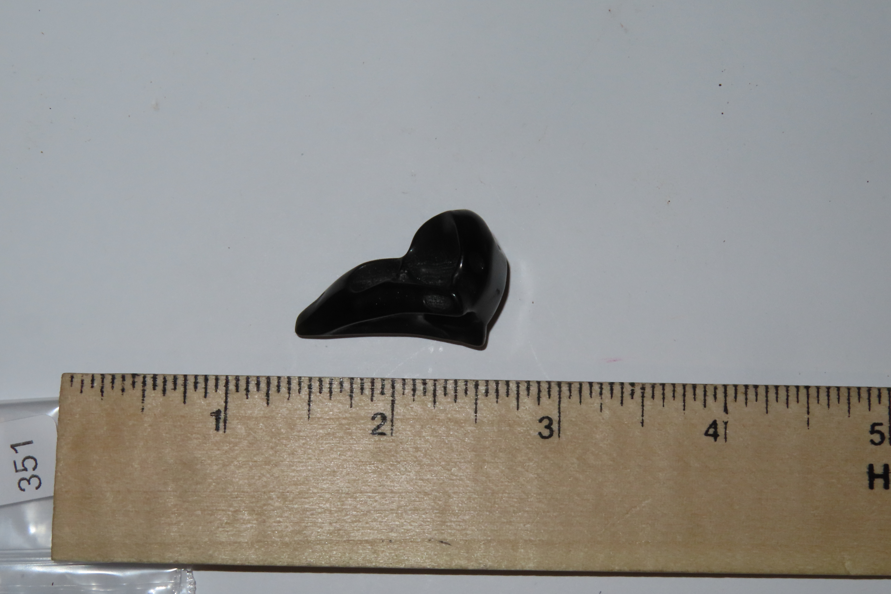 Incredible Pre-Columbian Obsidian Bird Head / Skull Effigy. Intricatly carved and polished with attention to detail. Translucent in some spo