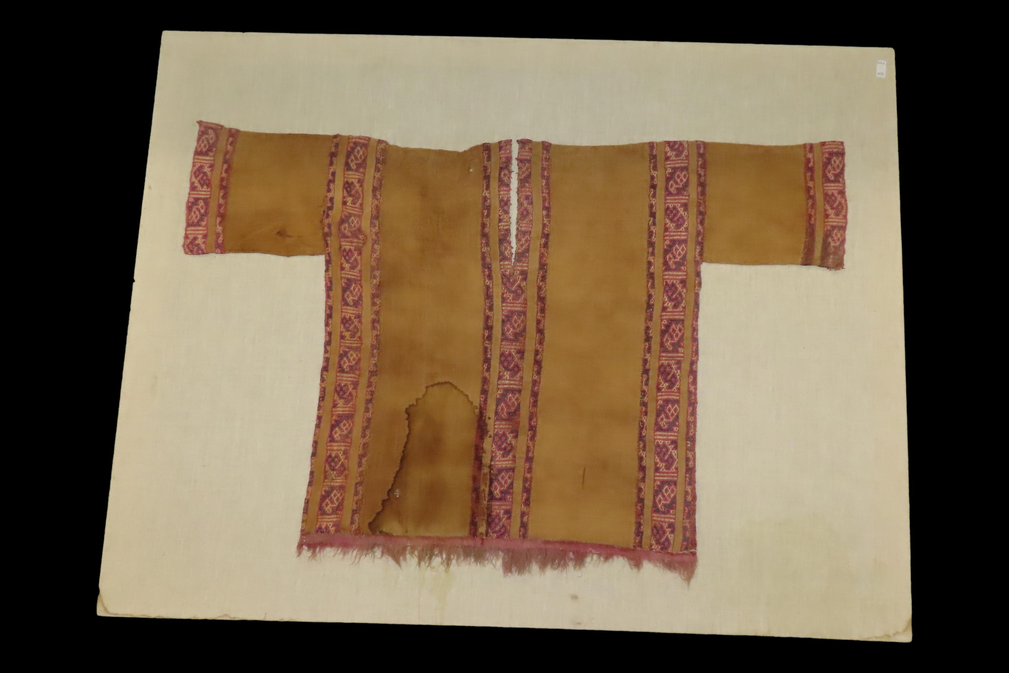 Rare Pre-Columbian Inca / Nazca Original Fabric Shirt, custom mounted on 40" x 31" frame. Nice rare artifact. Recovered in Peru.