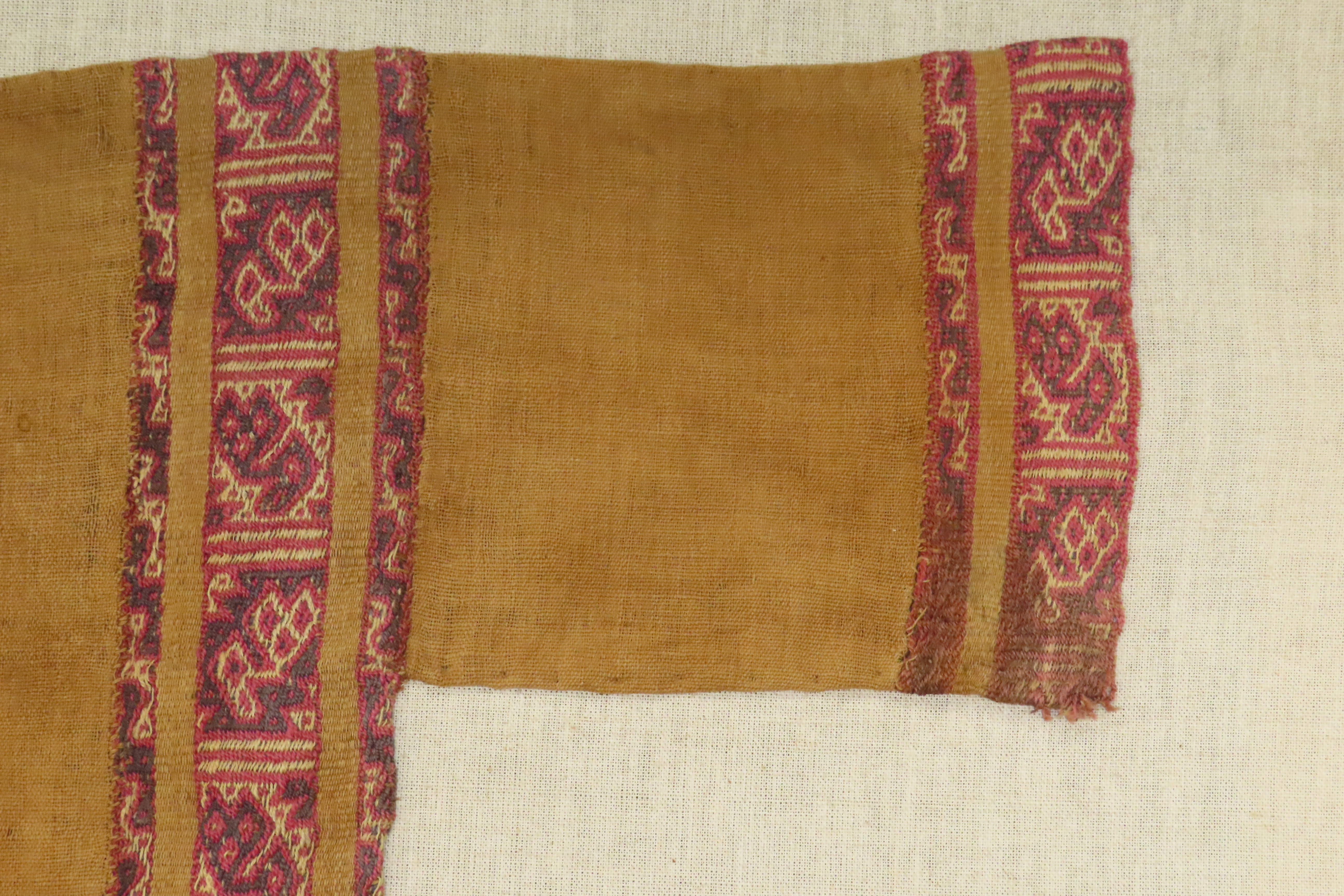 Rare Pre-Columbian Inca / Nazca Original Fabric Shirt, custom mounted on 40" x 31" frame. Nice rare artifact. Recovered in Peru.