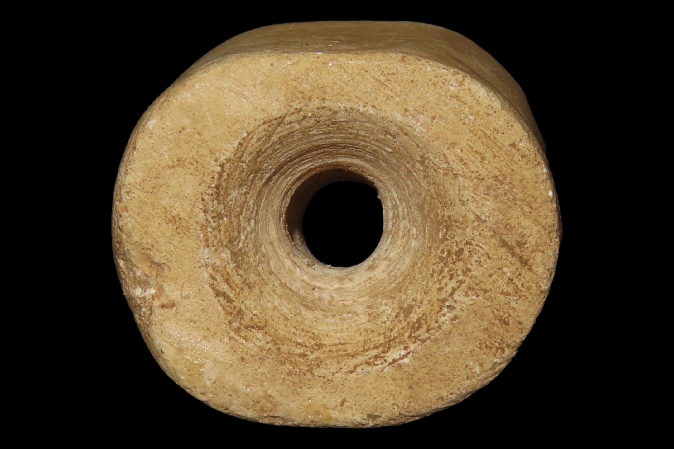 Huge Pre-Columbian Bi-Conically Drilled Stone Barrel Bead, Mexico. About 1 1/2" x 1 1/2". Nicely polished and heavily patinated Limestone.