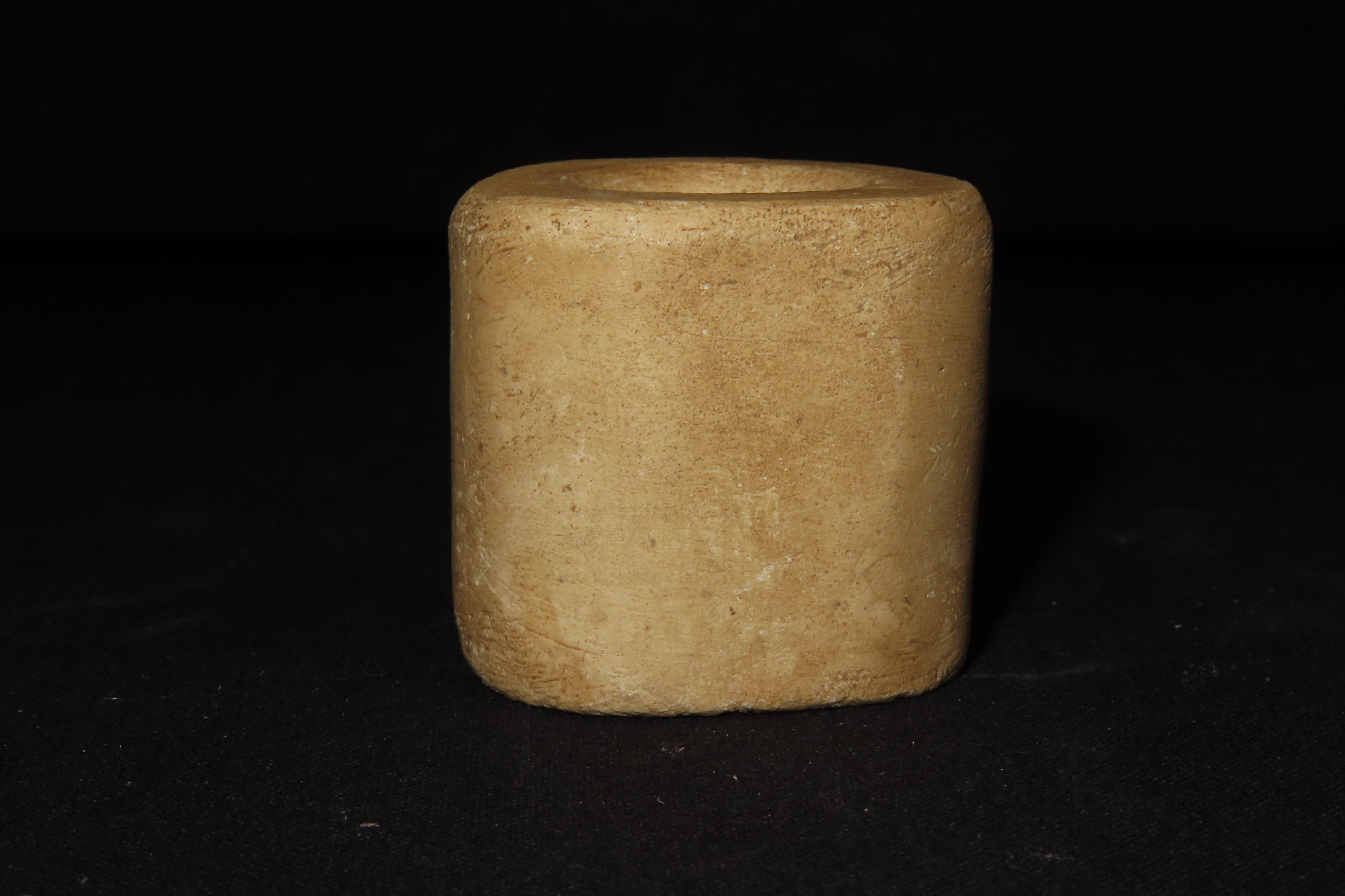 Huge Pre-Columbian Bi-Conically Drilled Stone Barrel Bead, Mexico. About 1 1/2" x 1 1/2". Nicely polished and heavily patinated Limestone.