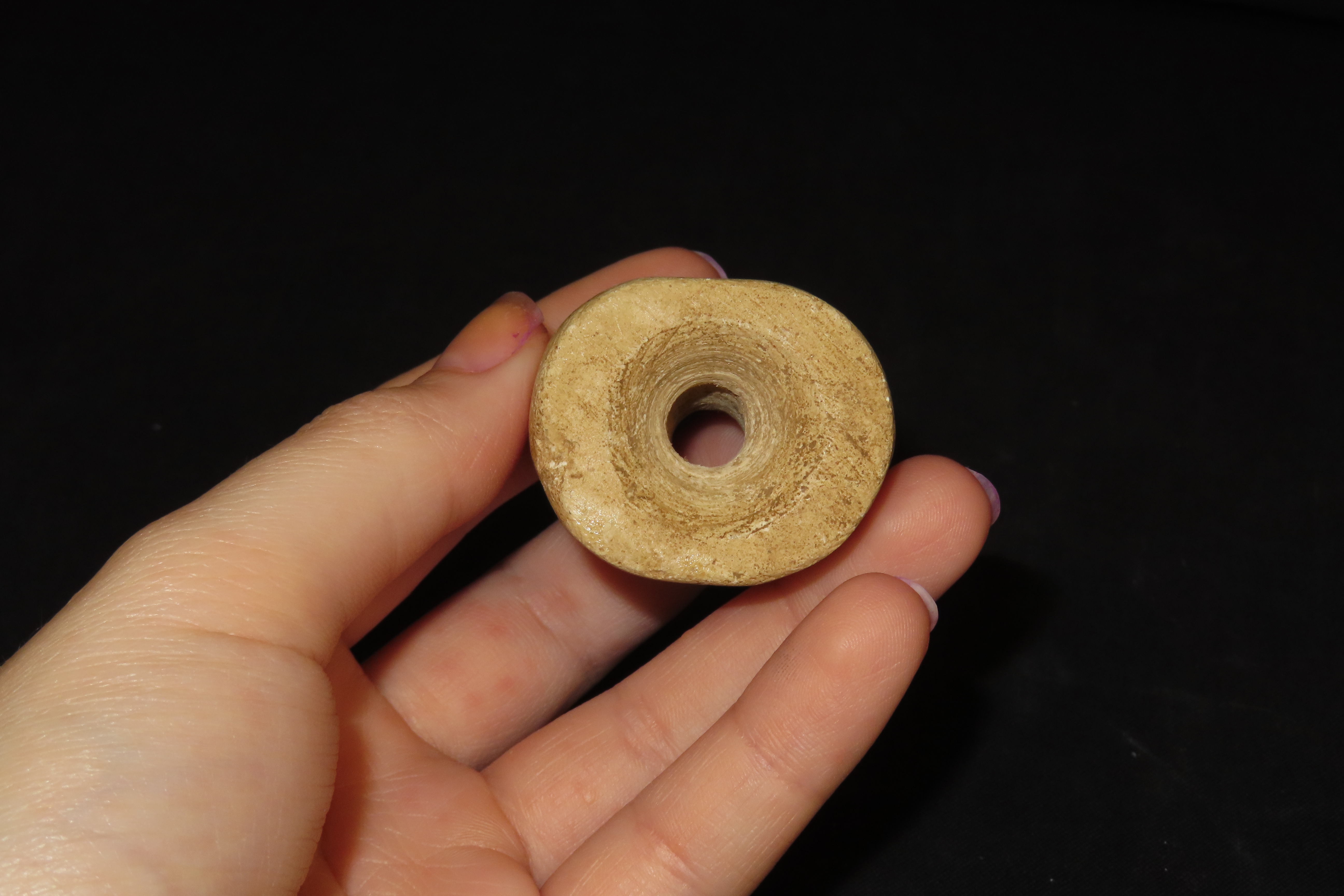 Huge Pre-Columbian Bi-Conically Drilled Stone Barrel Bead, Mexico. About 1 1/2" x 1 1/2". Nicely polished and heavily patinated Limestone.