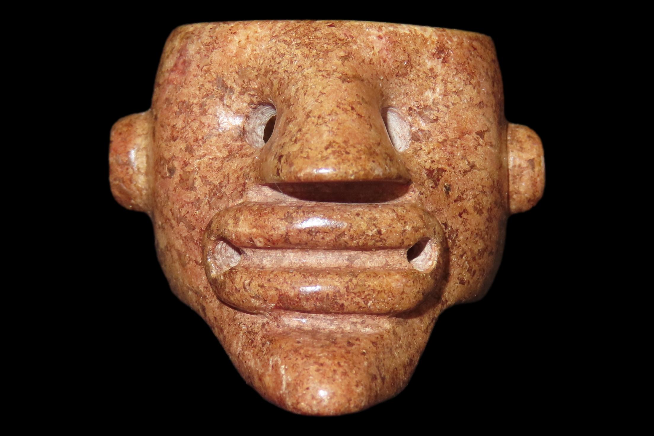 Rare Pre-Columbian Human Effigy Stone Ring. Highly Detailed and heavily Polished Brown Stone. Found in Guatemala.