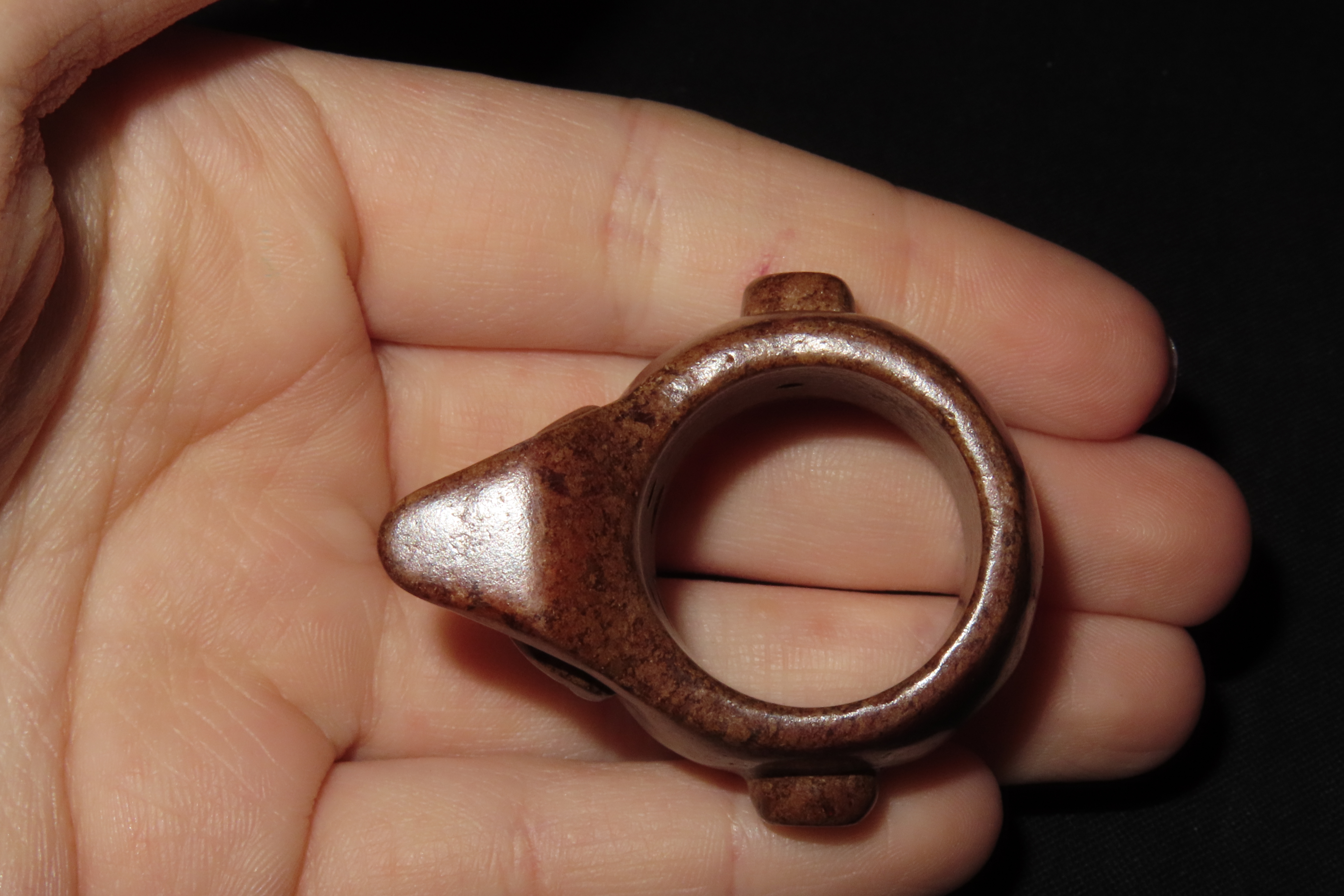 Rare Pre-Columbian Human Effigy Stone Ring. Highly Detailed and heavily Polished Brown Stone. Found in Guatemala.