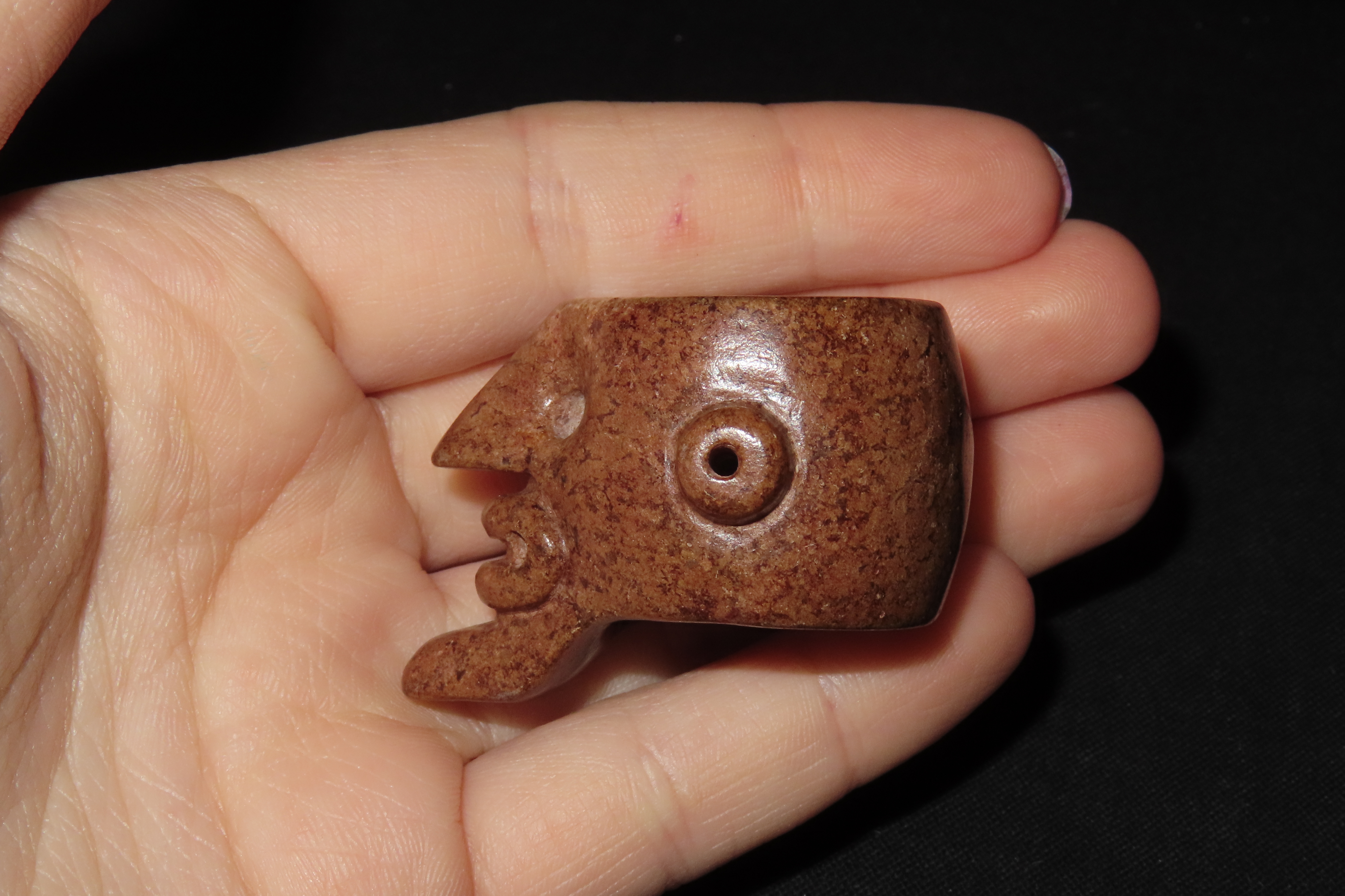 Rare Pre-Columbian Human Effigy Stone Ring. Highly Detailed and heavily Polished Brown Stone. Found in Guatemala.