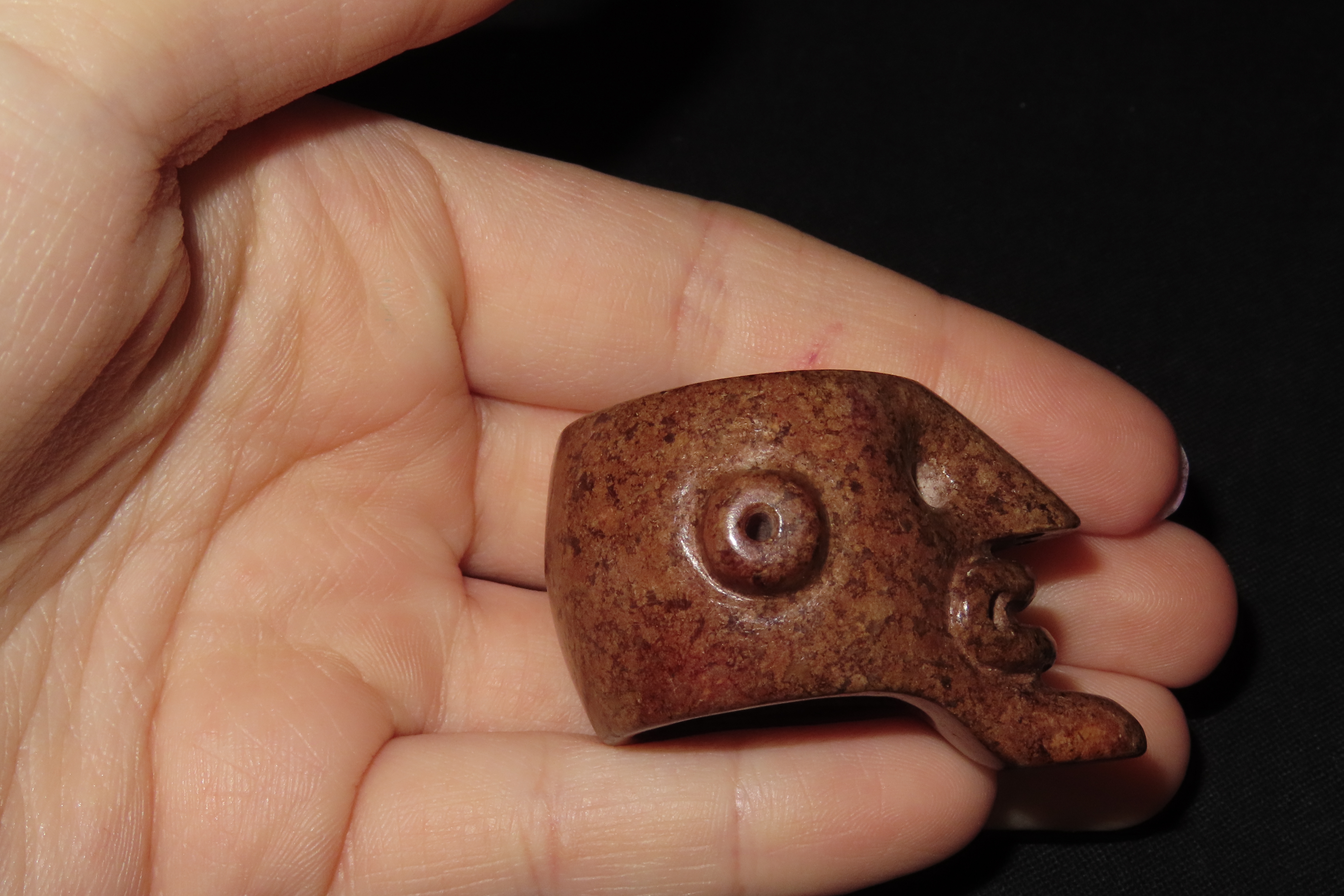 Rare Pre-Columbian Human Effigy Stone Ring. Highly Detailed and heavily Polished Brown Stone. Found in Guatemala.