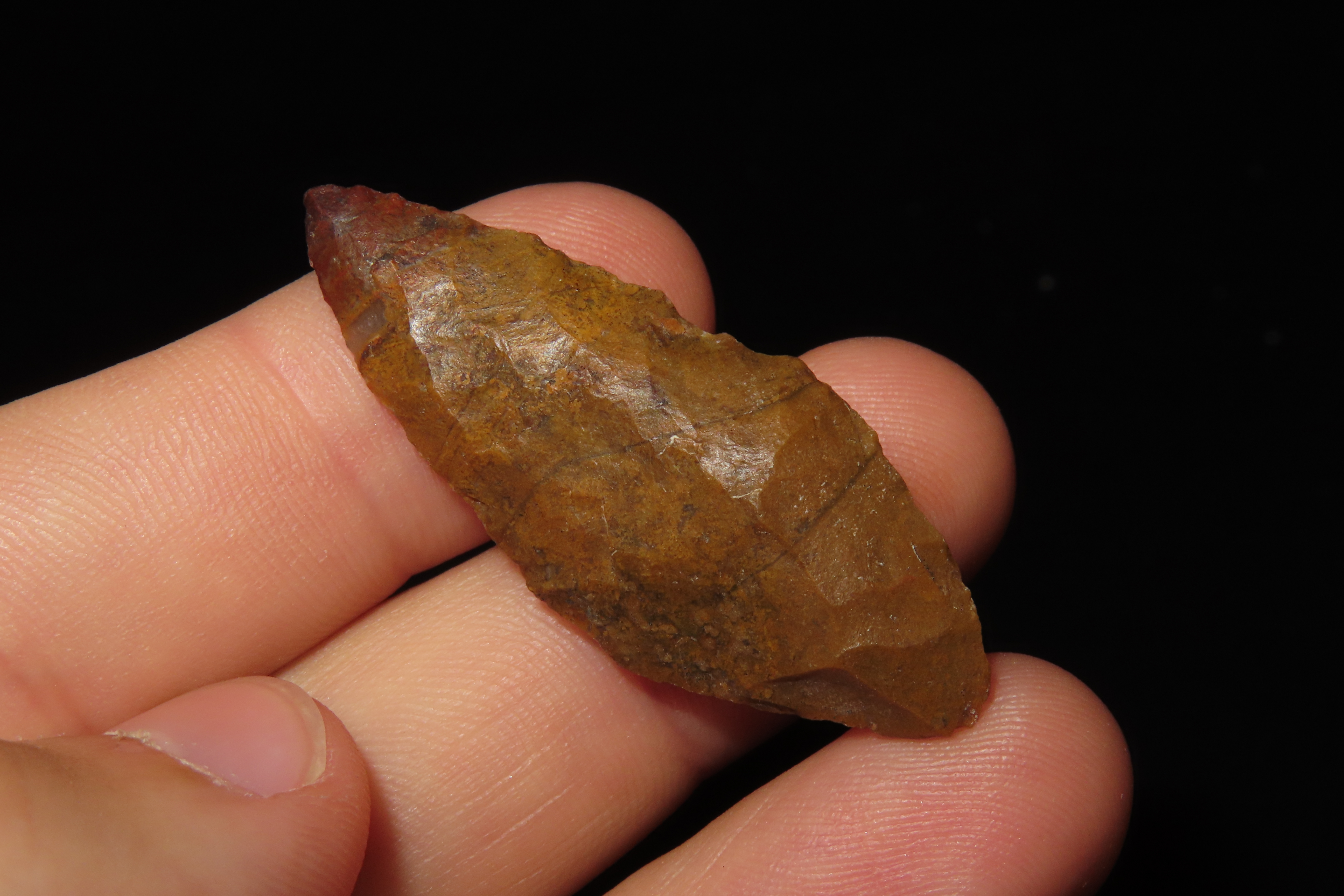 Beautiful Red & Orange Bi-Point Blade / Arrowhead from Colorado. Appears to be made from Fossilized Bino Bone. Colorful Example.