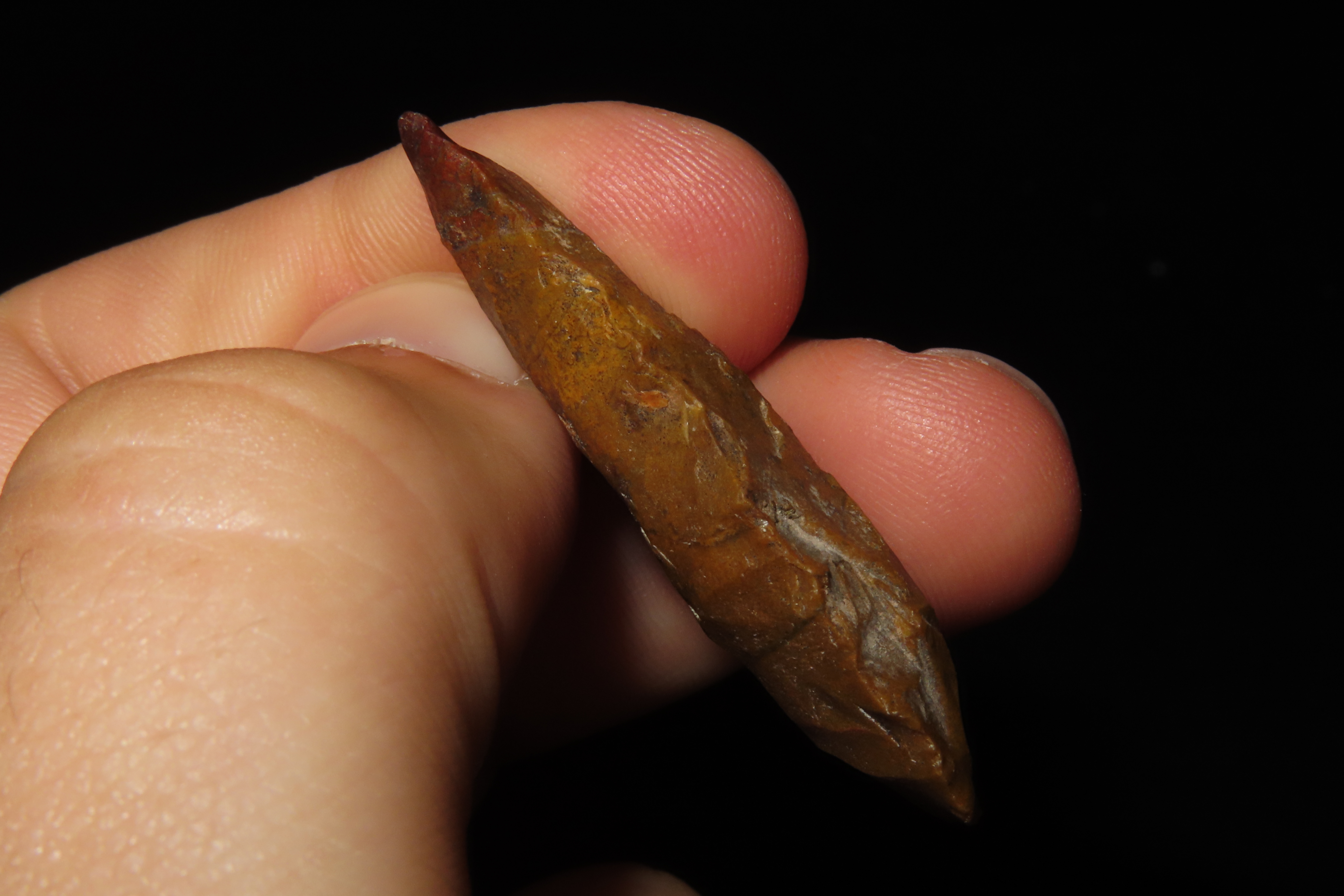 Beautiful Red & Orange Bi-Point Blade / Arrowhead from Colorado. Appears to be made from Fossilized Bino Bone. Colorful Example.