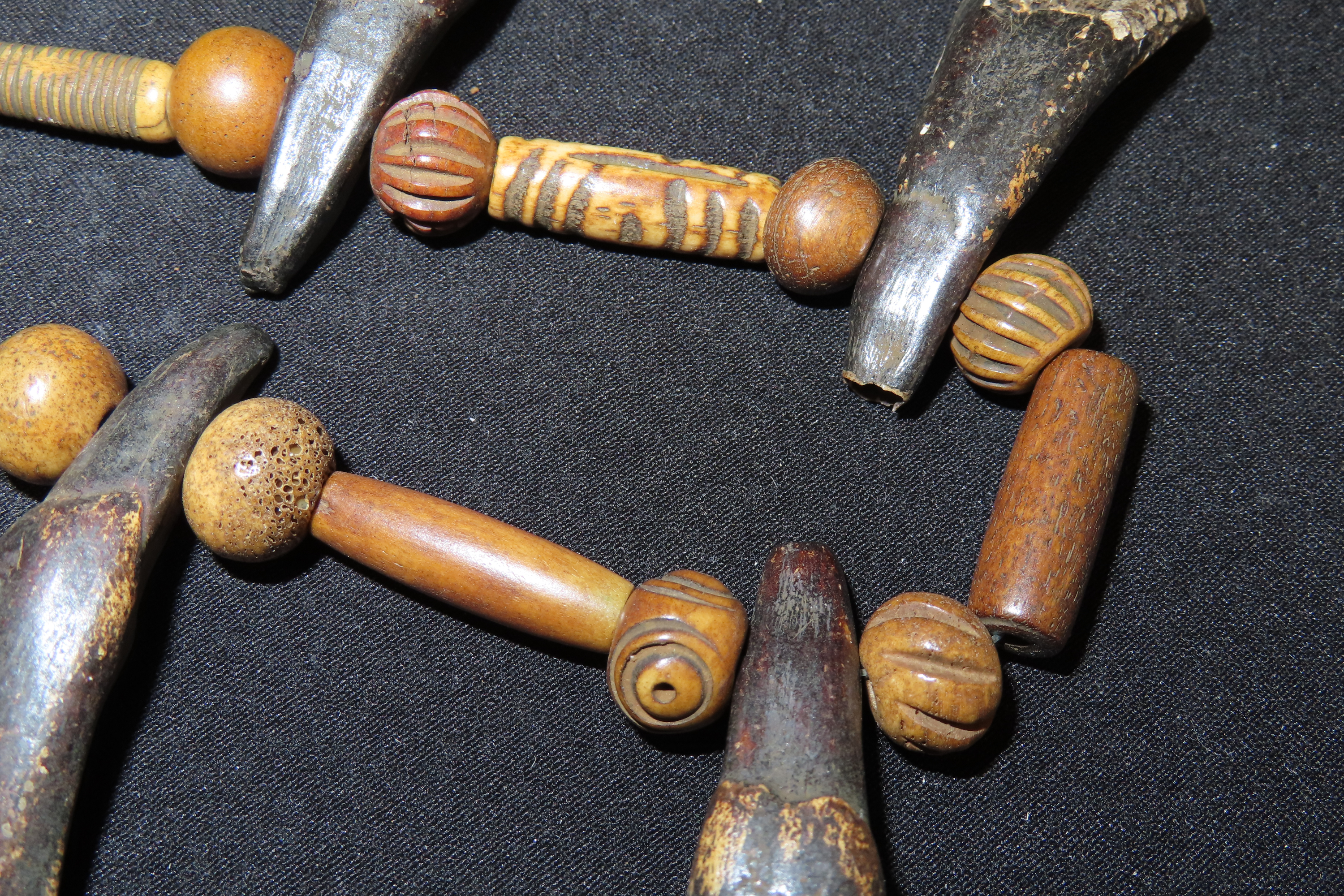 25" Plains Indian Drilled Buffalo Tooth Necklace with Chevron Trade Beads.