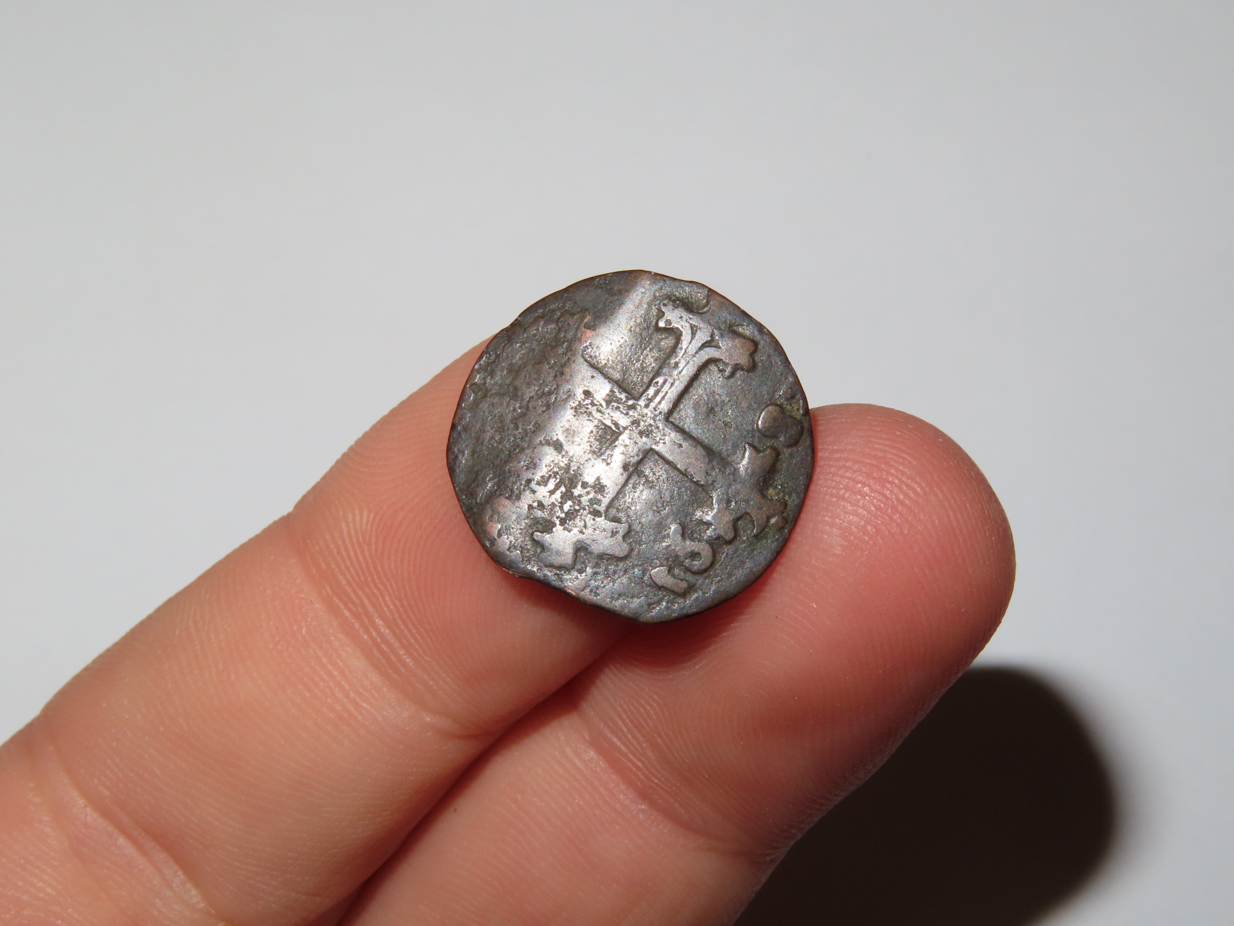 1687 Dated Colonial Era Coin with a Cross on one side, About the size of a Dime, Great Early Nearly 340 Year Old Coin