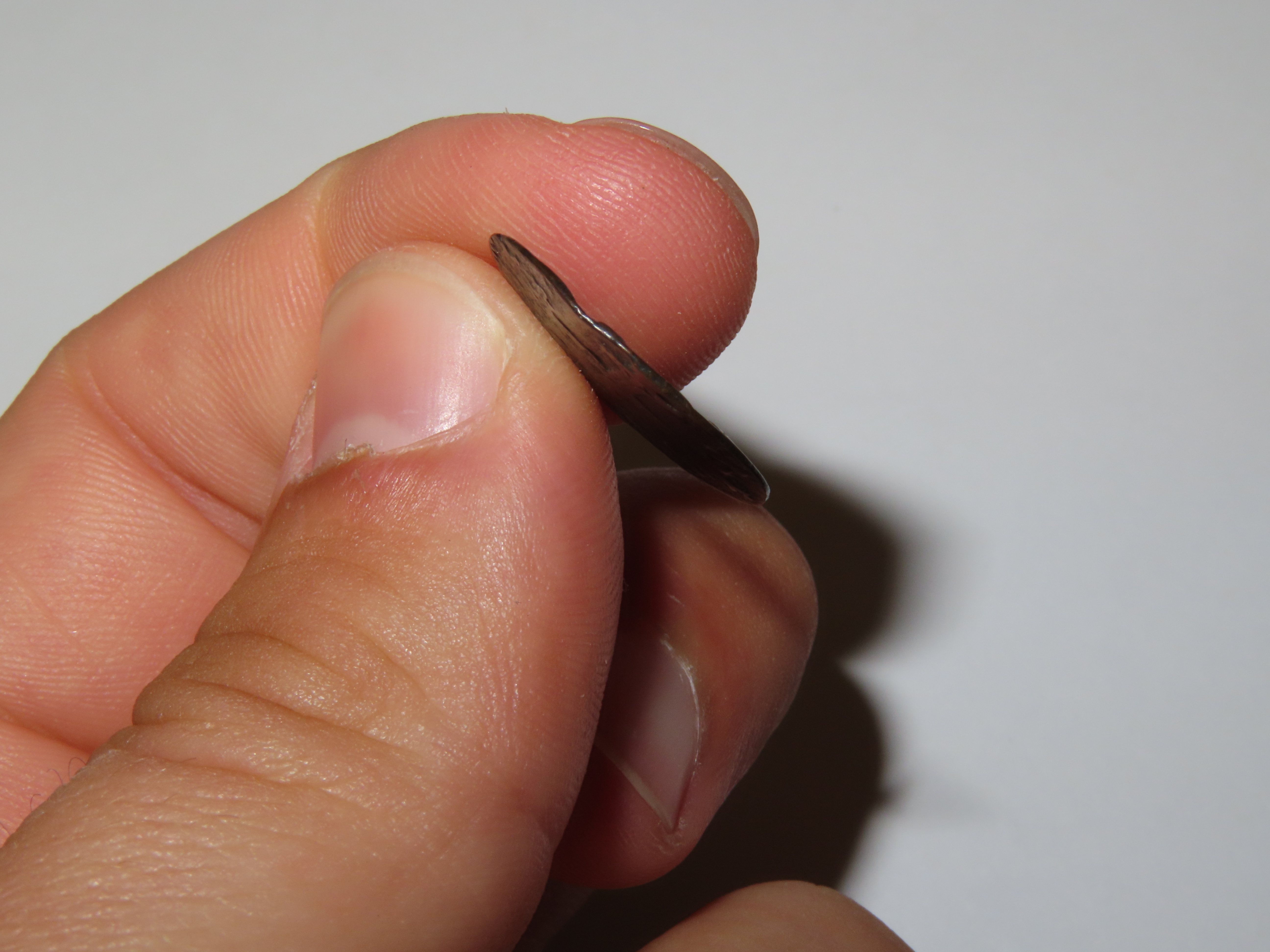 1687 Dated Colonial Era Coin with a Cross on one side, About the size of a Dime, Great Early Nearly 340 Year Old Coin