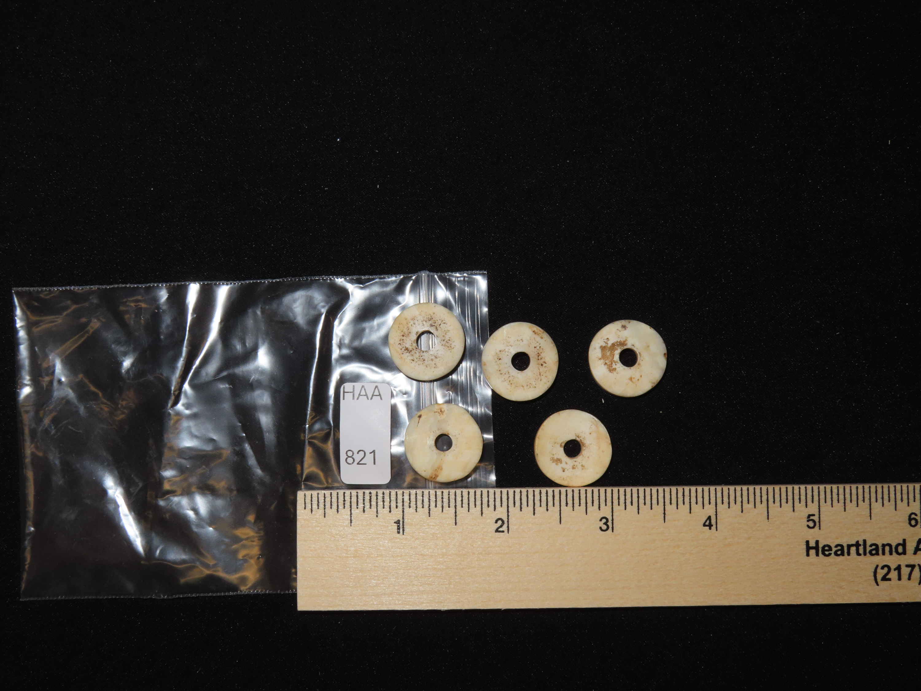 Nice Lot of Cahokia Shell Disc Beads found in Madison County Illinois.