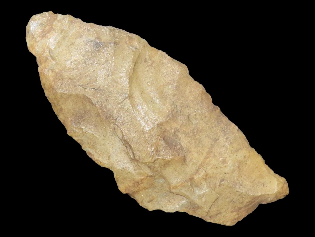 2 5/8" Paleo Suwanee found in Soutehrn Georgia. Heavily patinated old Indian Arrowhead.