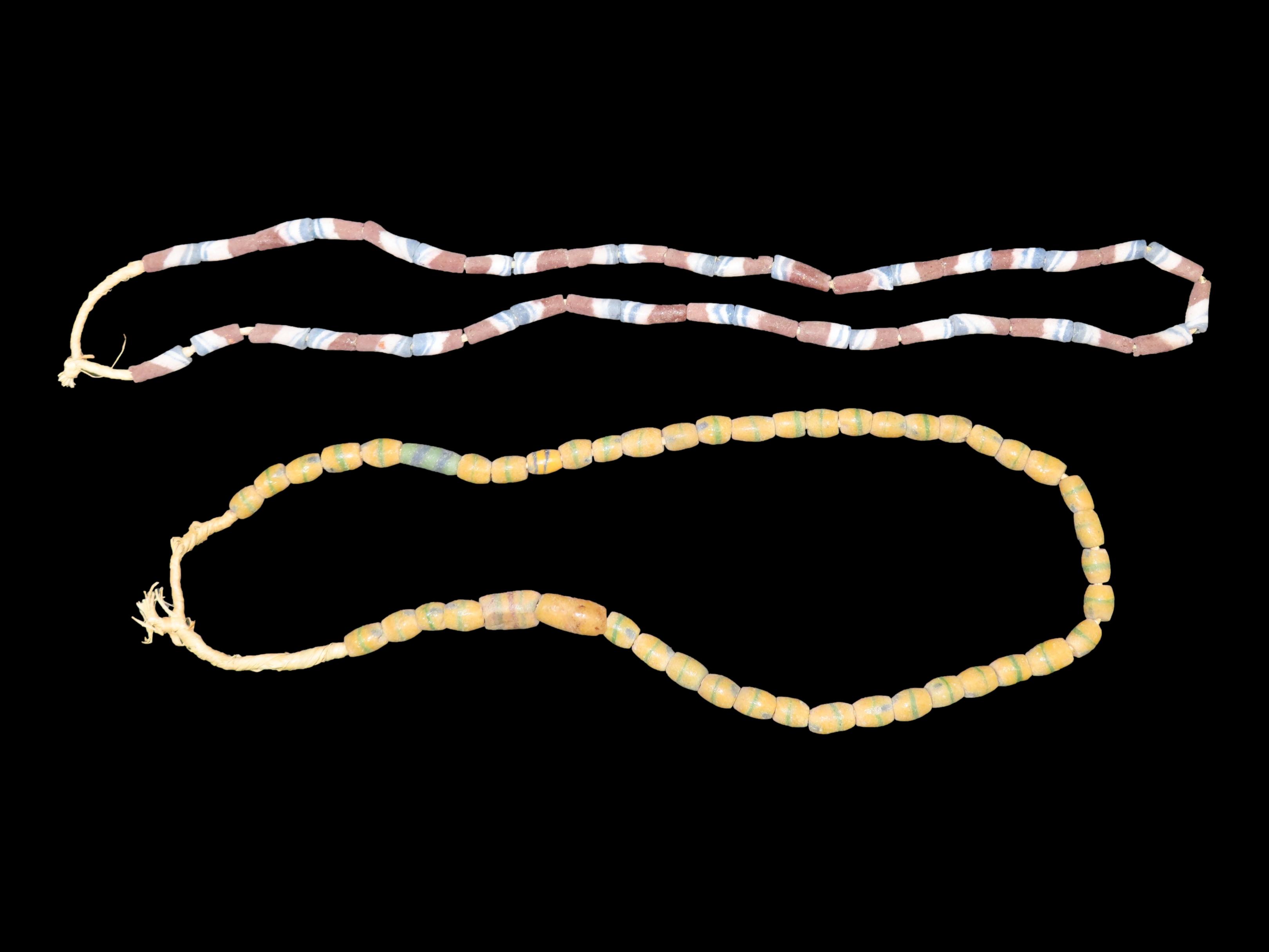 Two Colorful Strands of Sand Cast Trade Beads. Africa