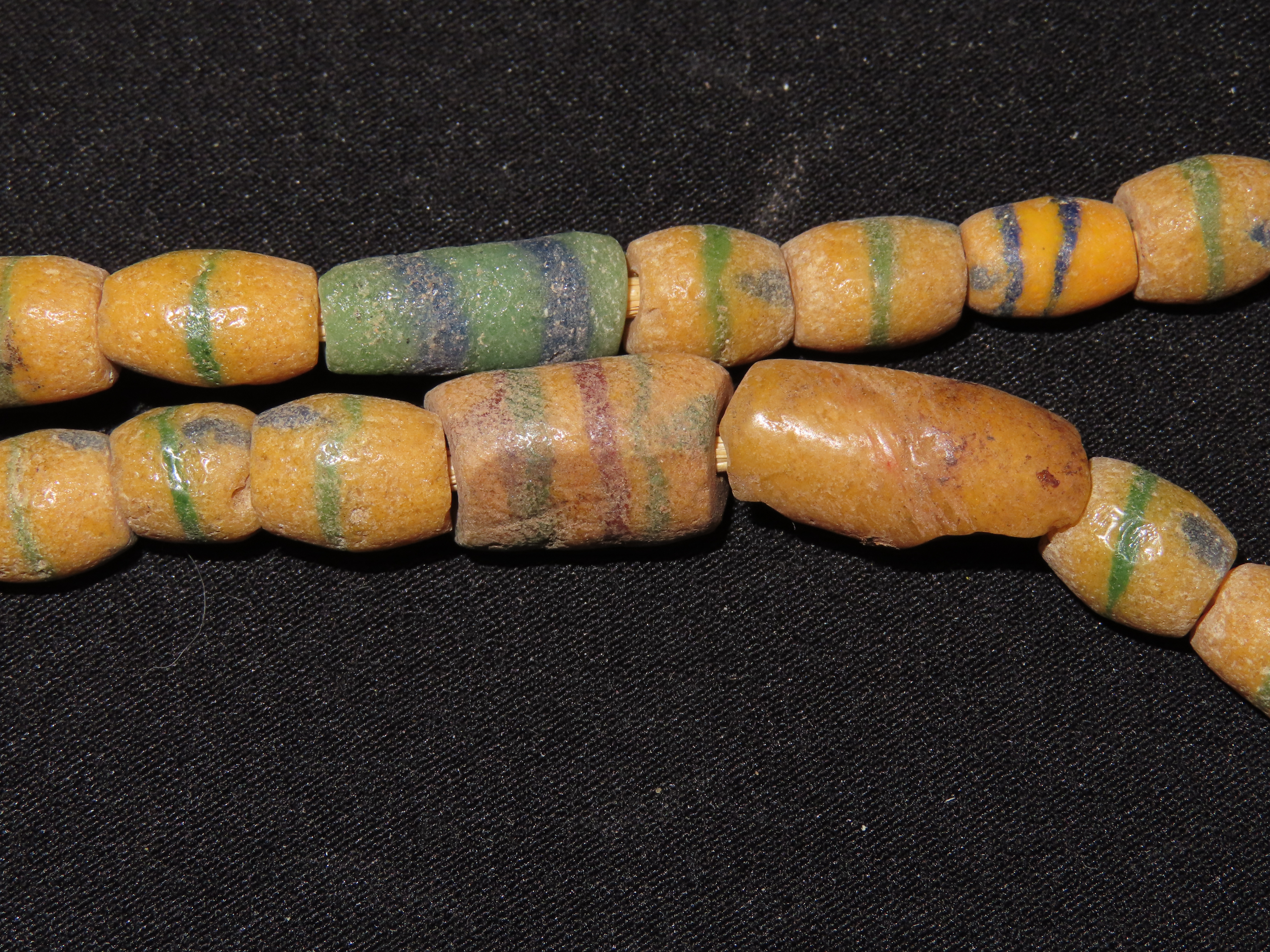 Two Colorful Strands of Sand Cast Trade Beads. Africa