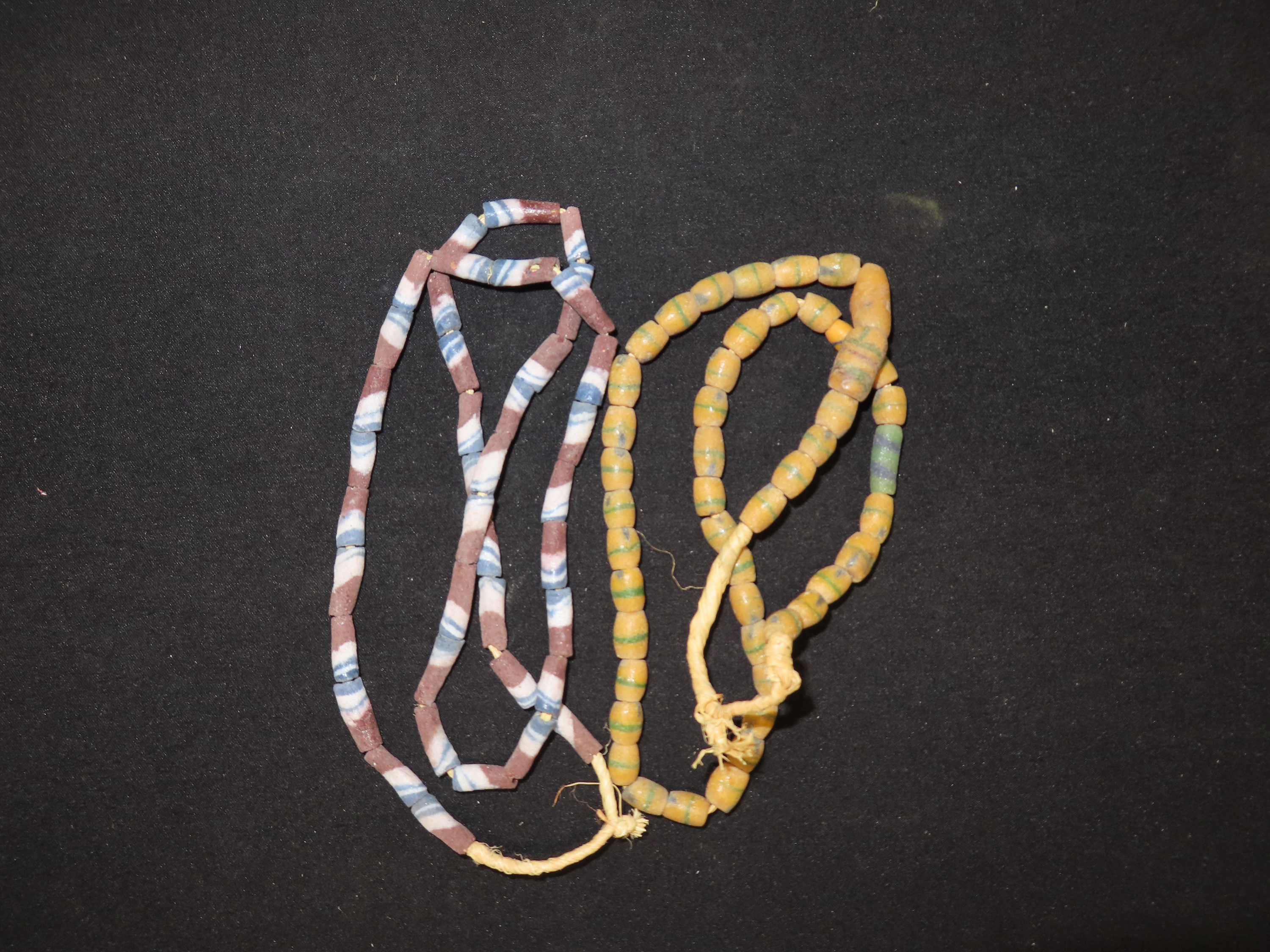 Two Colorful Strands of Sand Cast Trade Beads. Africa