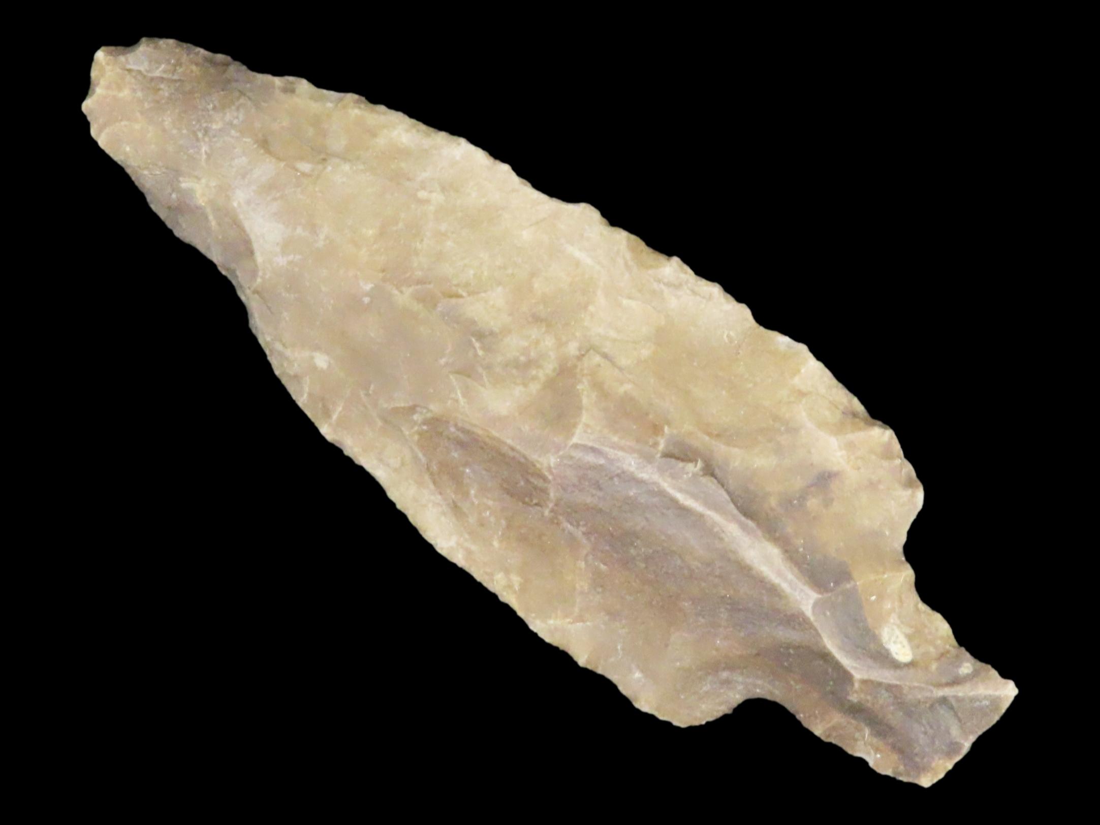 2 7/8" Heavily Patinated Archaic Stemmed Benton found in Wayne County Tennessee.