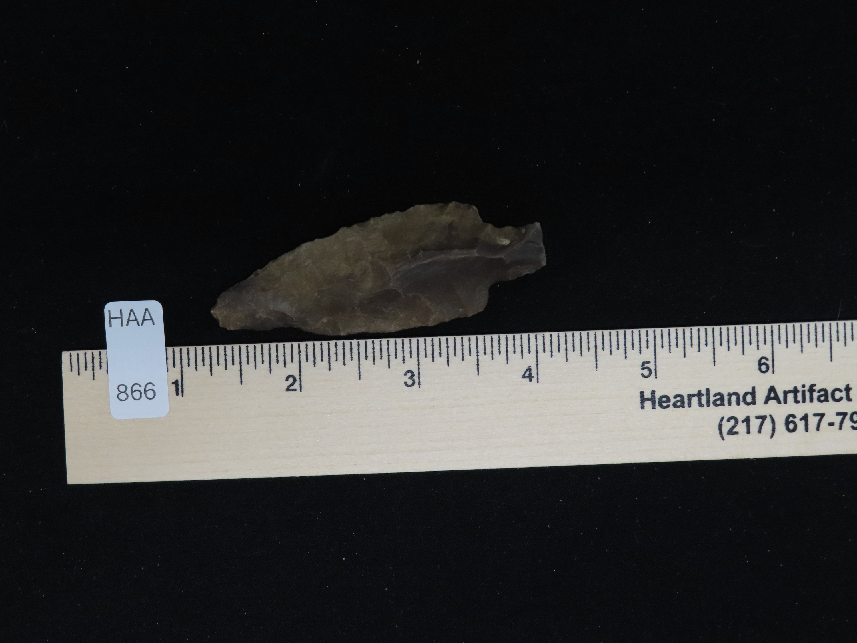 2 7/8" Heavily Patinated Archaic Stemmed Benton found in Wayne County Tennessee.